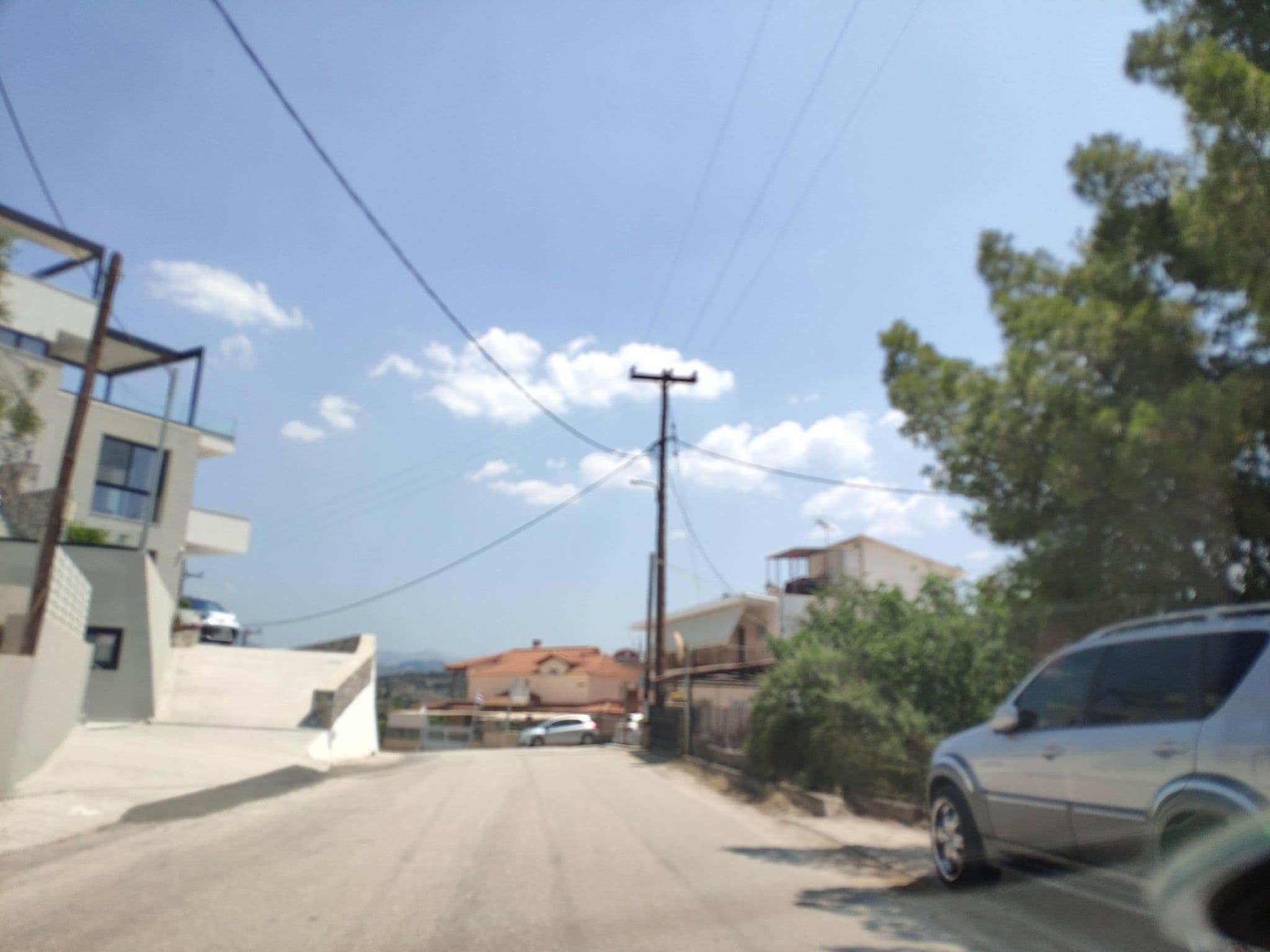Street view near Viaros Hotel Apartments, Tolón — © pppetros (CC BY-SA · Mapillary)