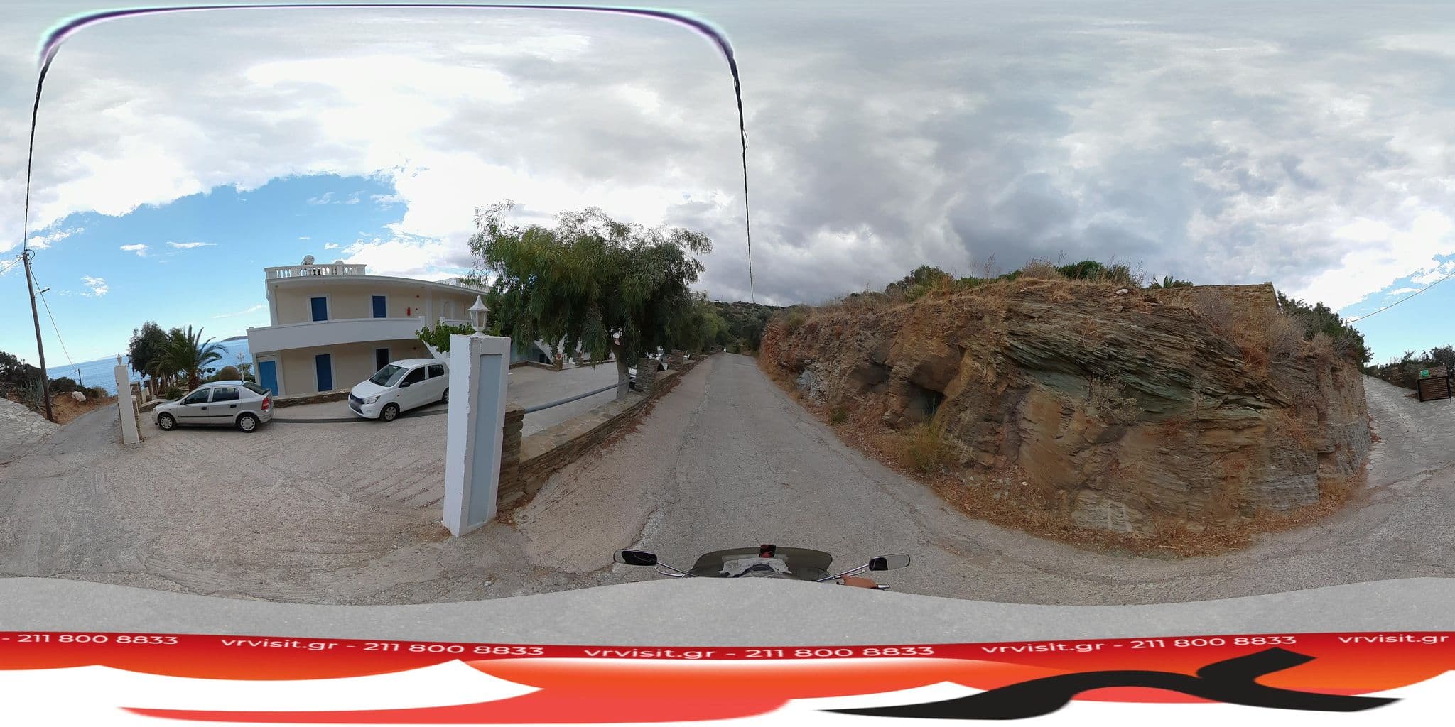 Street view near Aneroussa Beach, Batsíon — © VRvisit (CC BY-SA · Mapillary)