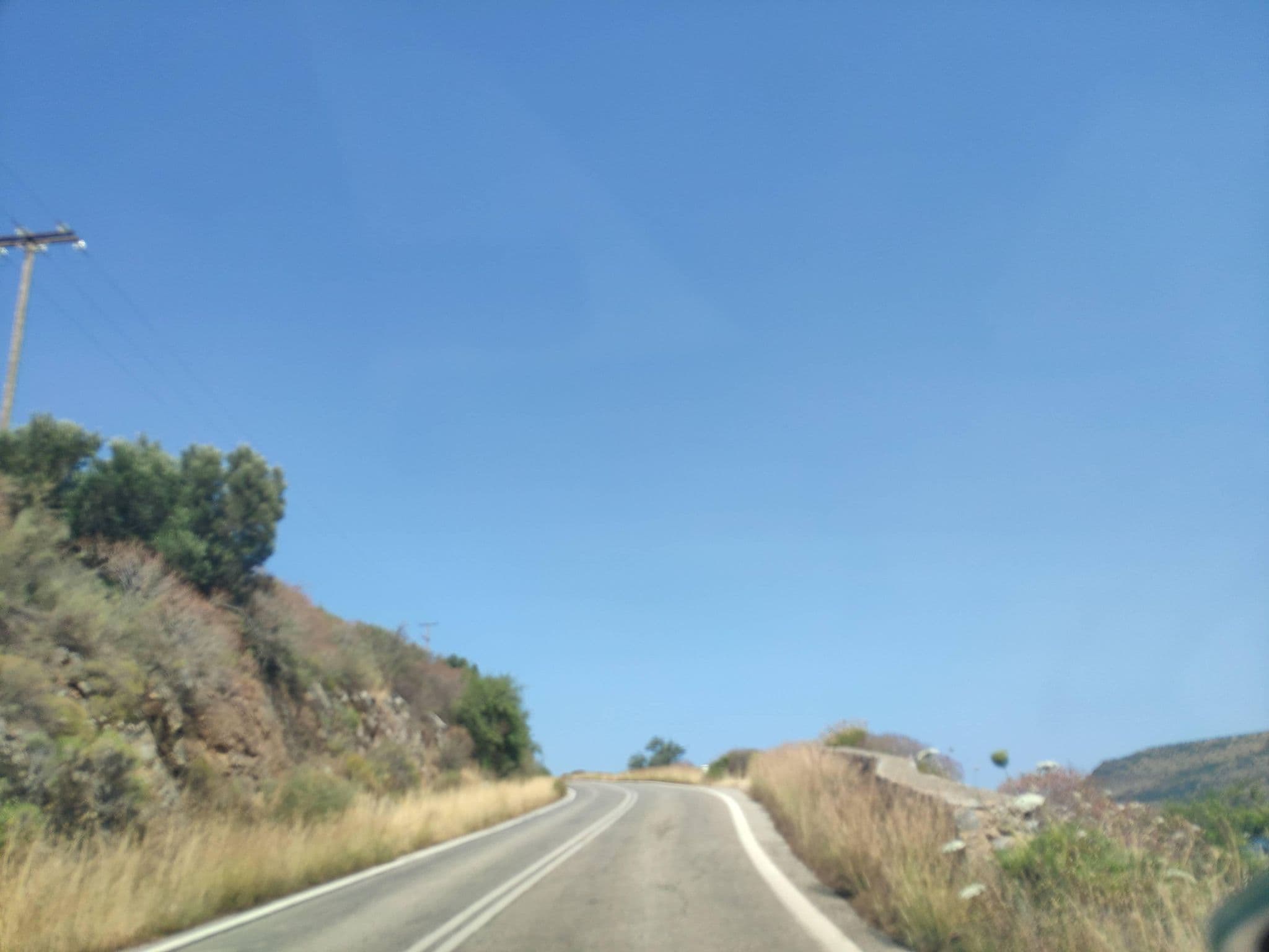 Street view near Vasilios Apartments Hotel, Oítilon — © pppetros (CC BY-SA · Mapillary)