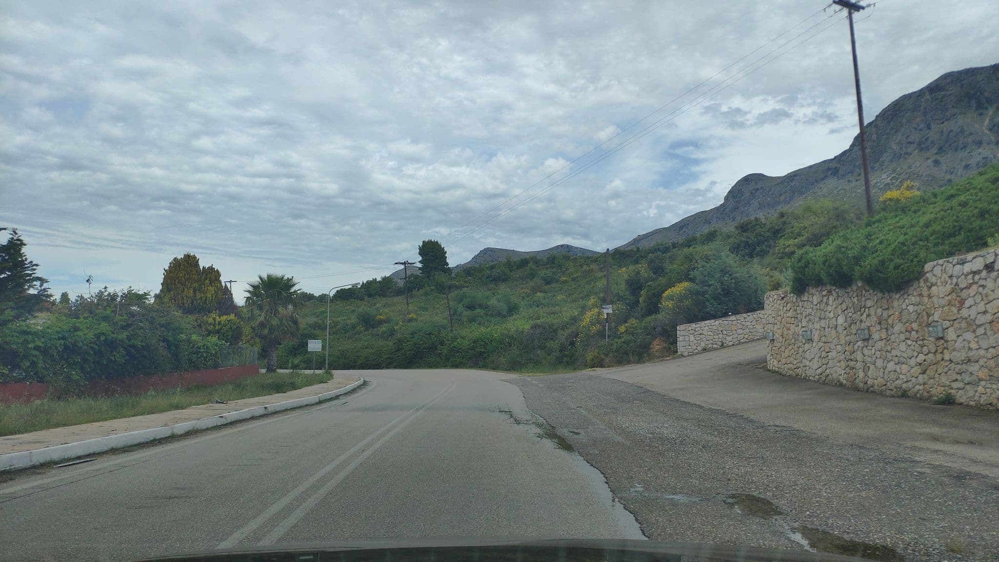 Street view near Emilios Villas, Pálairos — © pppetros (CC BY-SA · Mapillary)