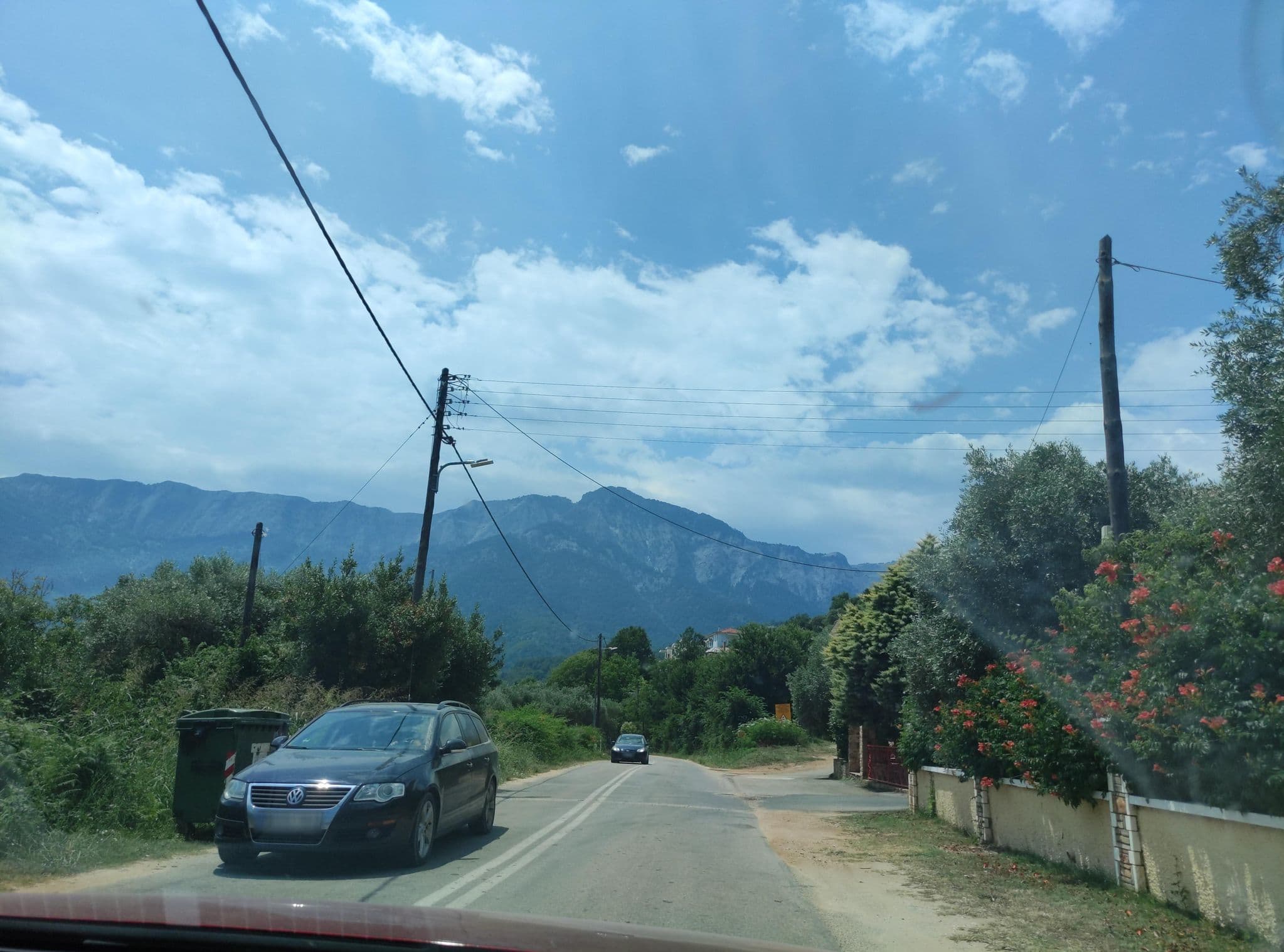 Street view near Studios Nostos, Potamiá — © neau (CC BY-SA · Mapillary)