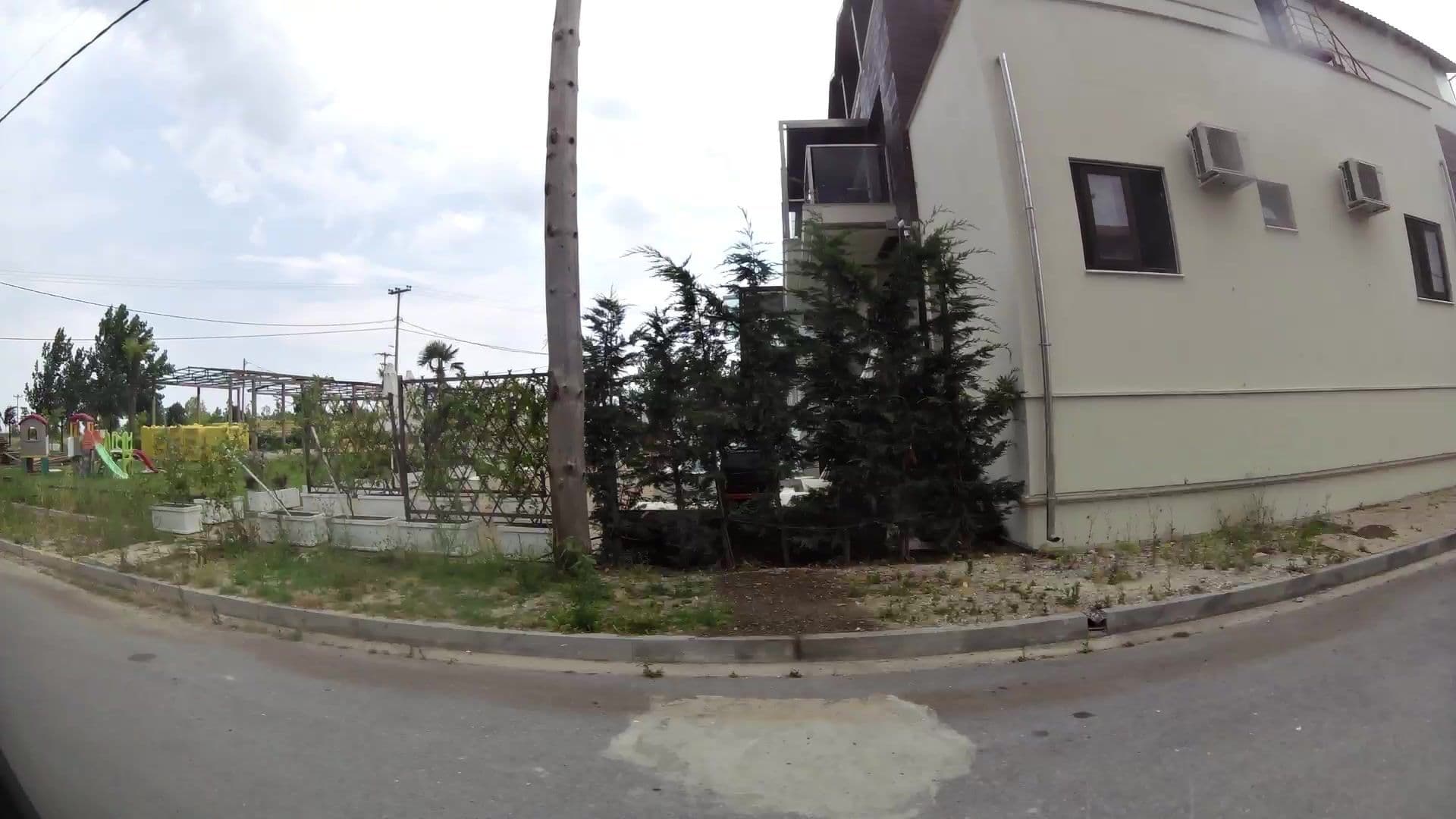 Street view near Golden Olympus, Korinós — © kaartcam (CC BY-SA · Mapillary)