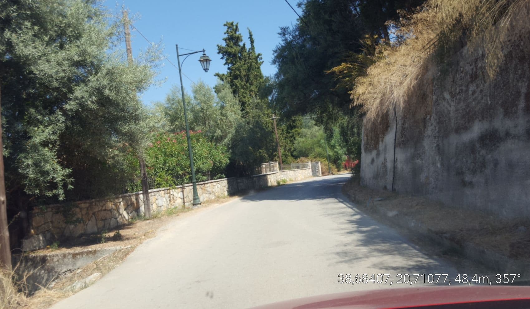 Street view near Cleopatra Beach, Nidhríon — © samsam7575 (CC BY-SA · Mapillary)