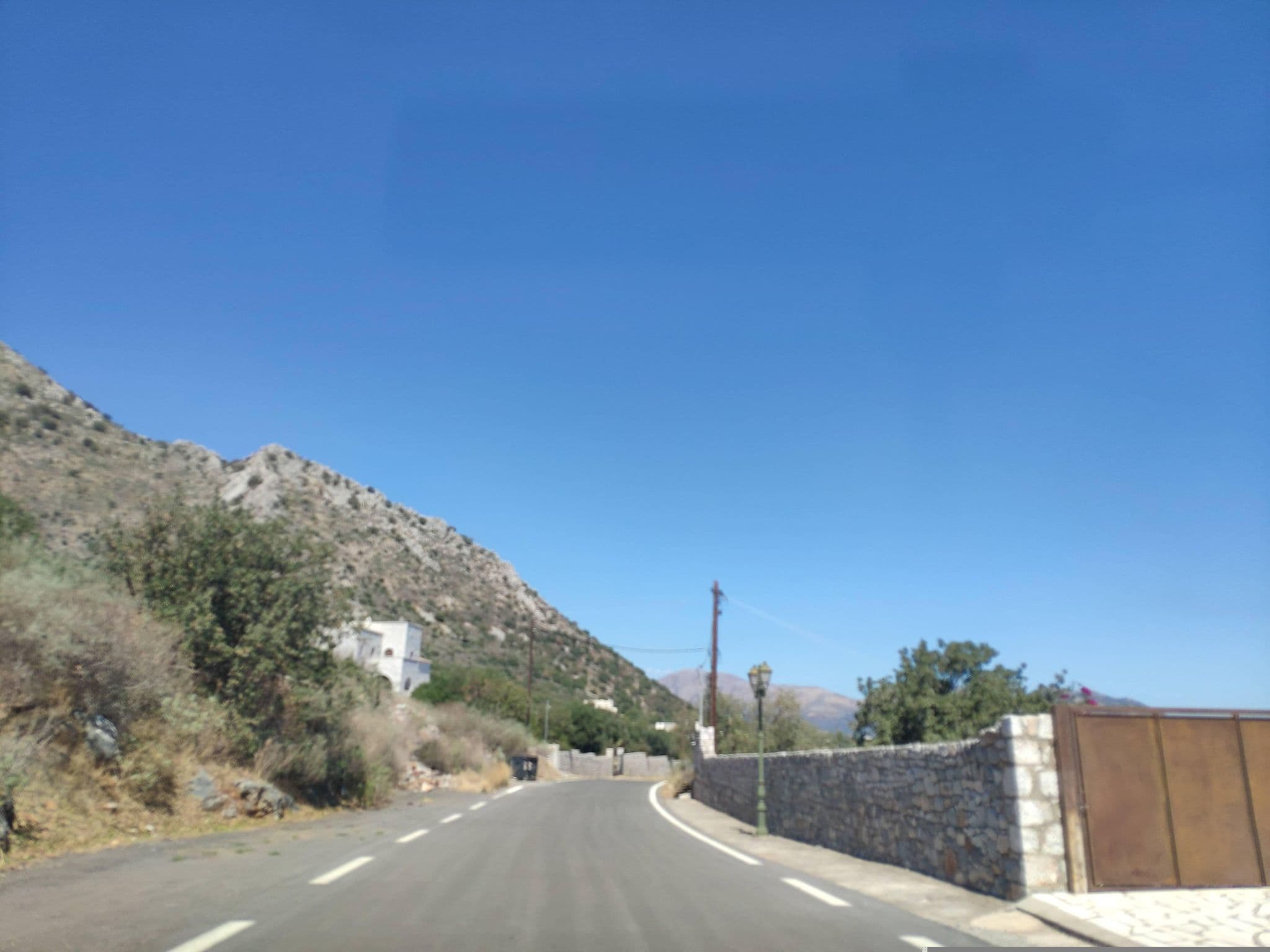 Street view near Aegila boutique hotel, Oítilon — © pppetros (CC BY-SA · Mapillary)