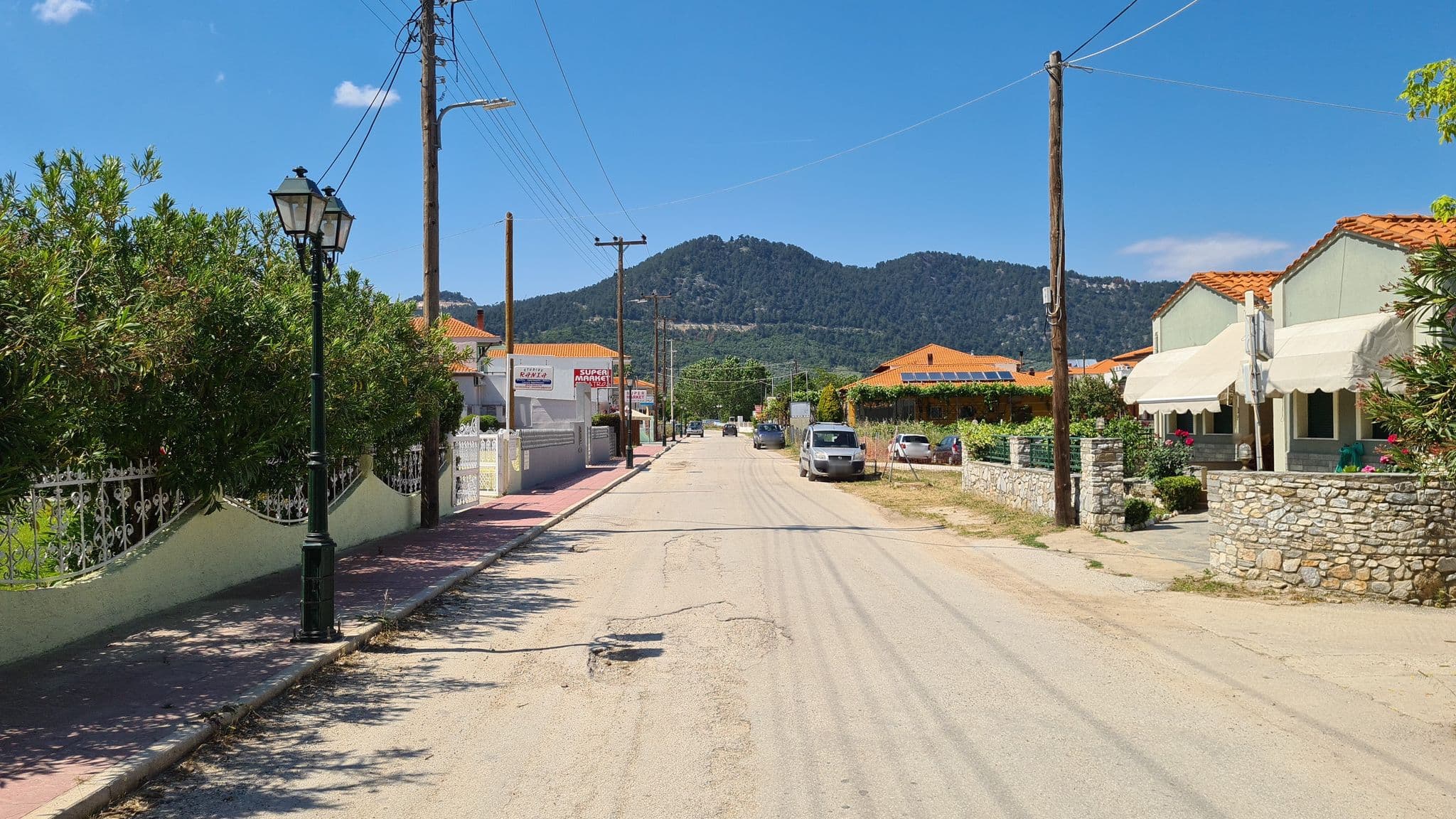 Street view near Thalassa Apartments, Potamiá — © mappi0920 (CC BY-SA · Mapillary)