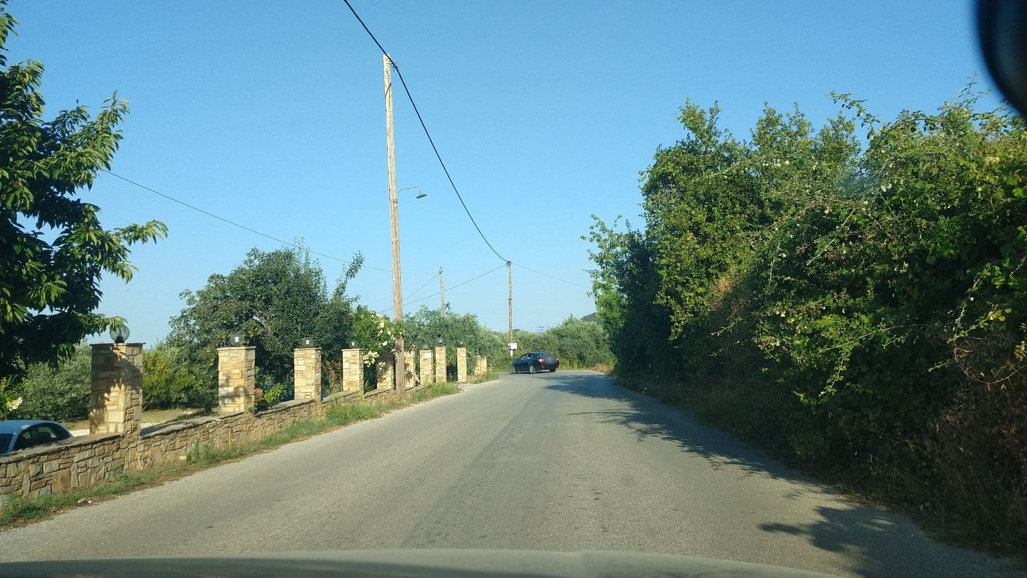 Street view near Achilion, Potamiá — © lucia_ (CC BY-SA · Mapillary)
