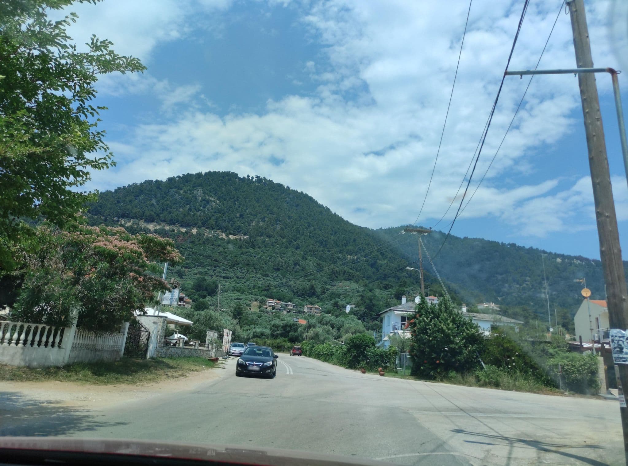 Street view near Porto Marina, Potamiá — © neau (CC BY-SA · Mapillary)