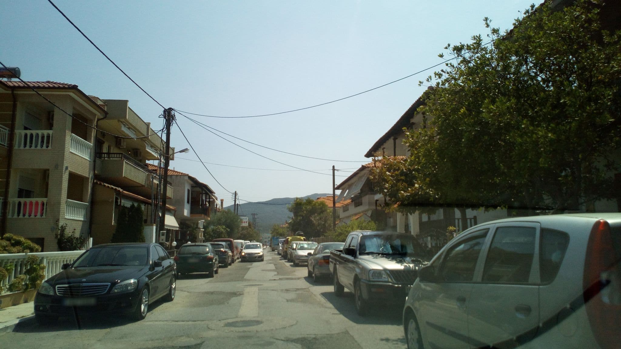 Street view near Hanna Haus, Sárti — © skarmoutsosv (CC BY-SA · Mapillary)
