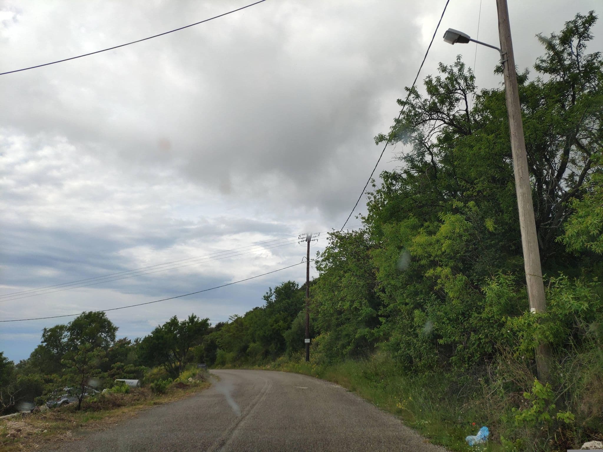 Street view near AMADRYADES VILLAS, Nidhríon — © pppetros (CC BY-SA · Mapillary)