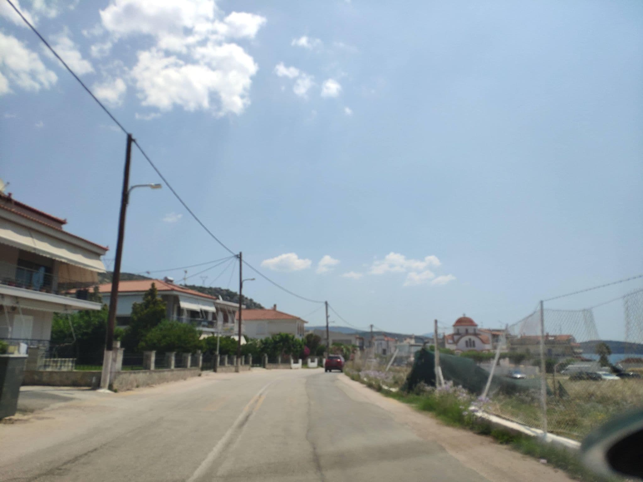 Street view near Stork Apartments, Drépanon — © pppetros (CC BY-SA · Mapillary)