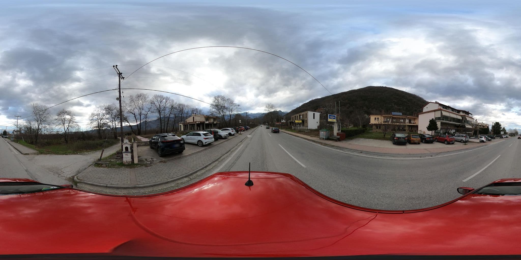 Street view near Drosia Hotel, Polykárpi — © nglf (CC BY-SA · Mapillary)