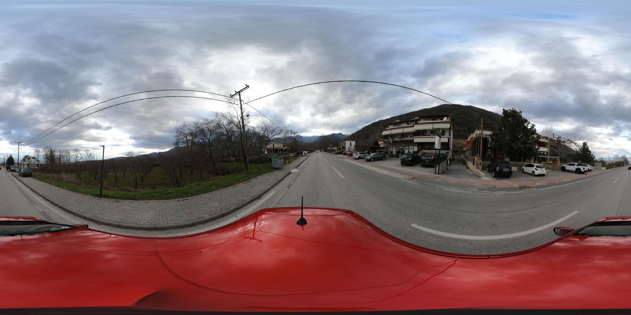Street view near Agapi Luxury Hotel, Polykárpi — © nglf (CC BY-SA · Mapillary)