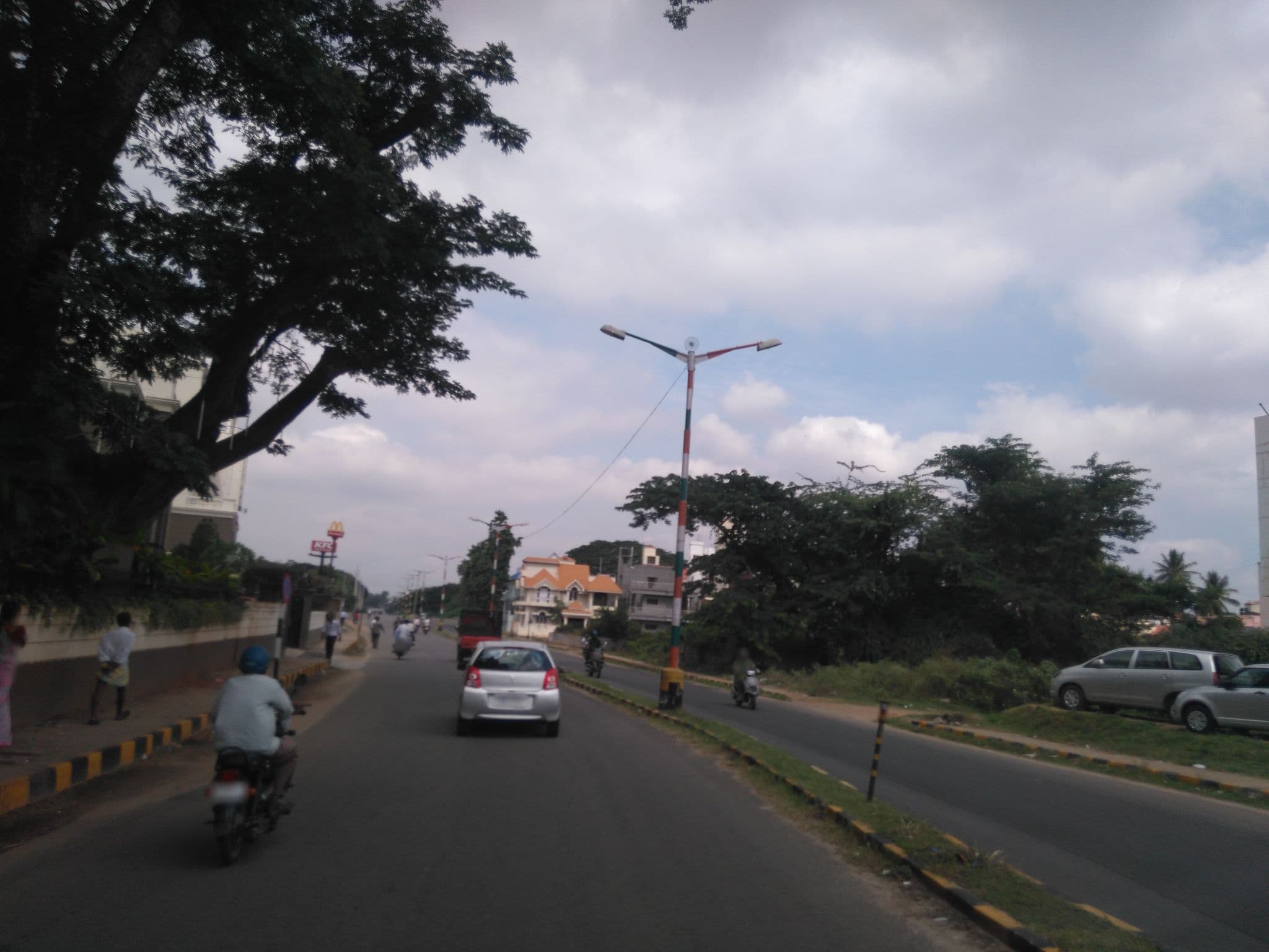 Street view near Radisson Blu Plaza Hotel, Mysuru — © jacklee (CC BY-SA · Mapillary)