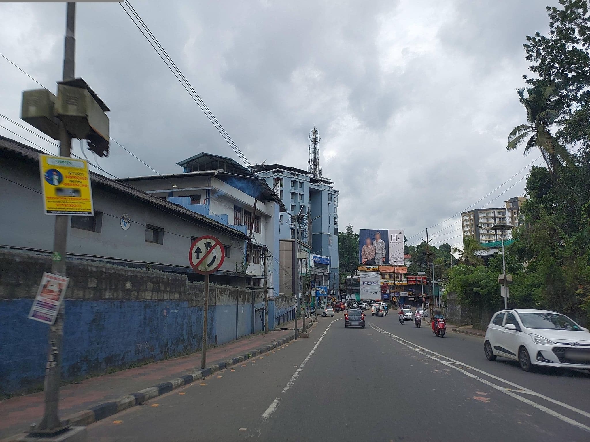 Street view near YWCA Hostel, Kottayam — © V15 (CC BY-SA · Mapillary)