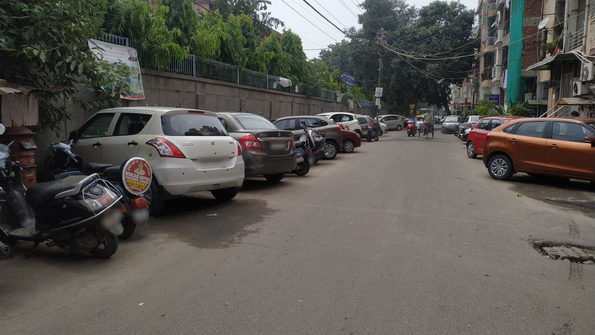 Street view near Airbnb - Cozy apartment, New Delhi — © chethan9 (CC BY-SA · Mapillary)