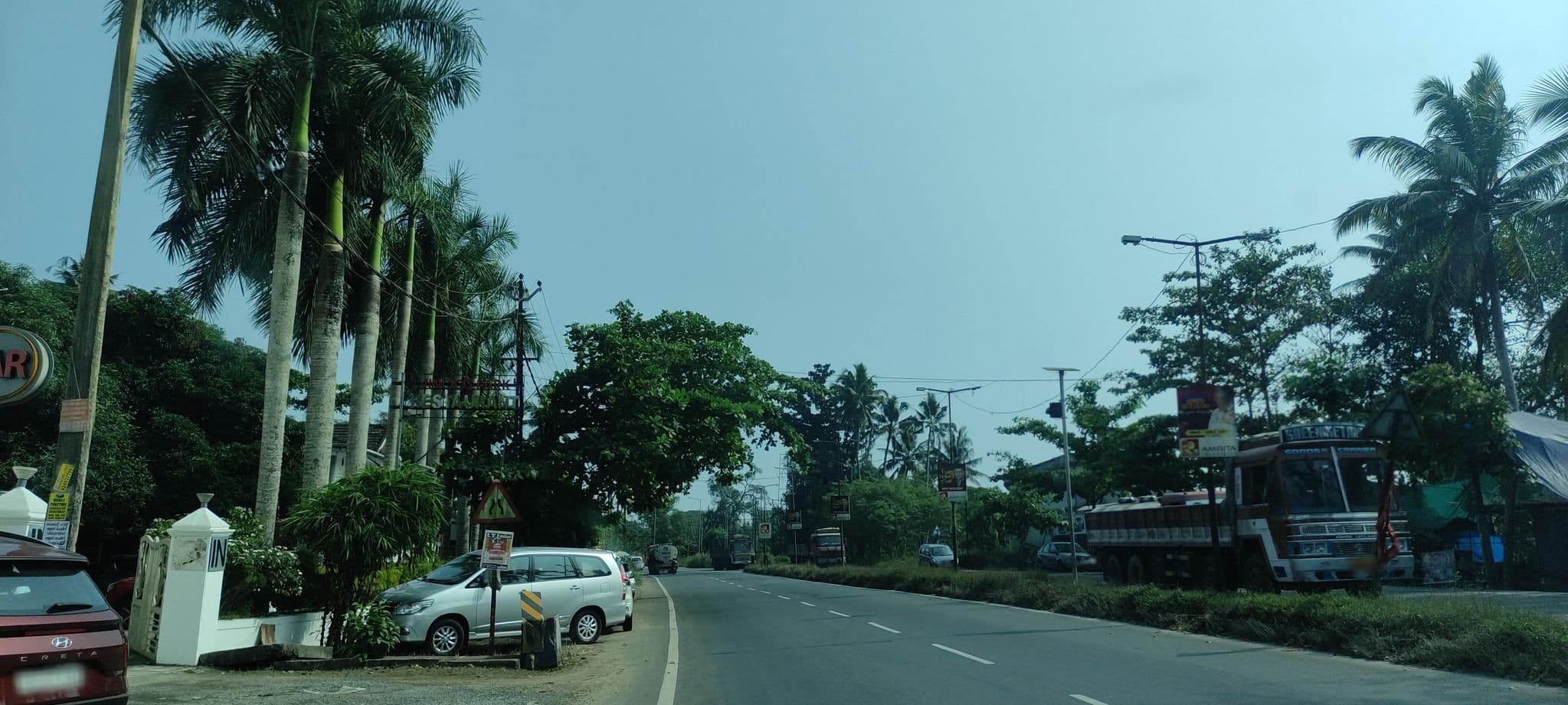 Street view near Karthiyayini Hotel, Cherthala — © V15 (CC BY-SA · Mapillary)