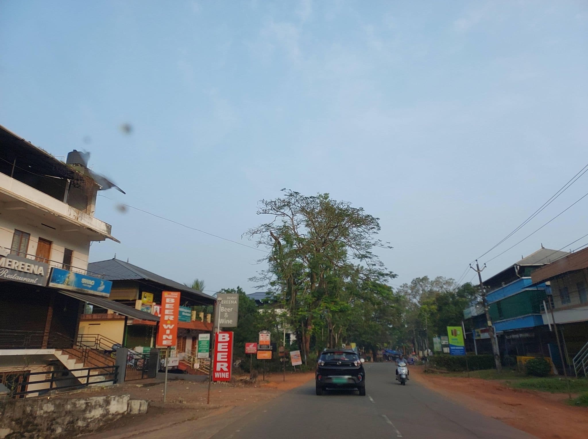 Street view near Hotel Mereena restaurent Beer & wine, Puthuppally — © V15 (CC BY-SA · Mapillary)