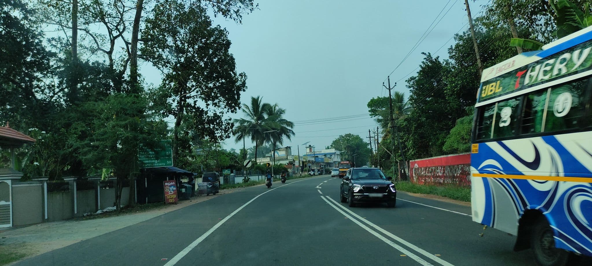 Street view near Padinjattethil Harmony, Adūr — © V15 (CC BY-SA · Mapillary)