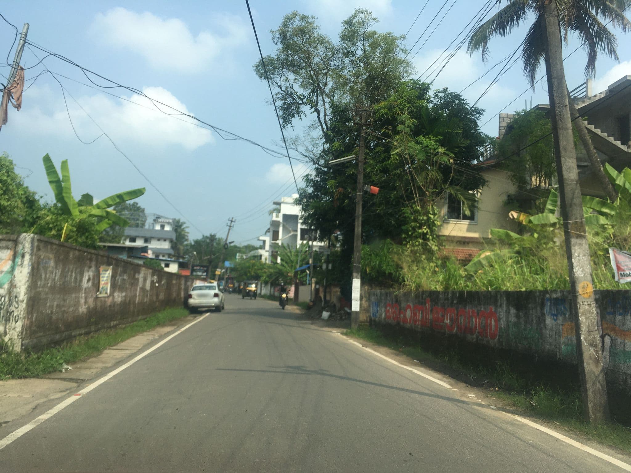 Street view near Deepa Gents Hostel, Cheranellūr — © livableurbanism (CC BY-SA · Mapillary)