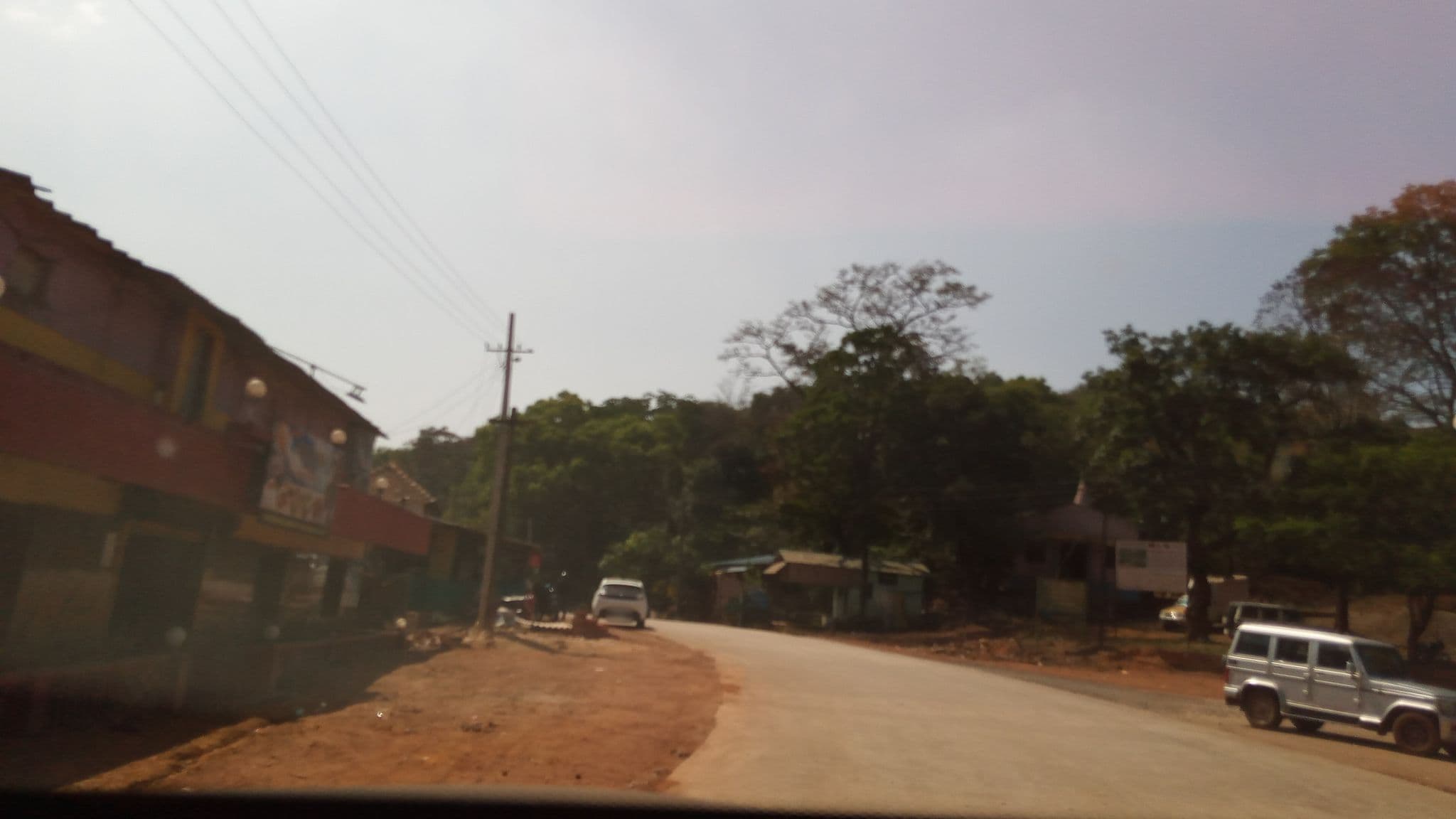 Street view near Hotel Dhanaraj, Valpoi — © pradeepbv (CC BY-SA · Mapillary)