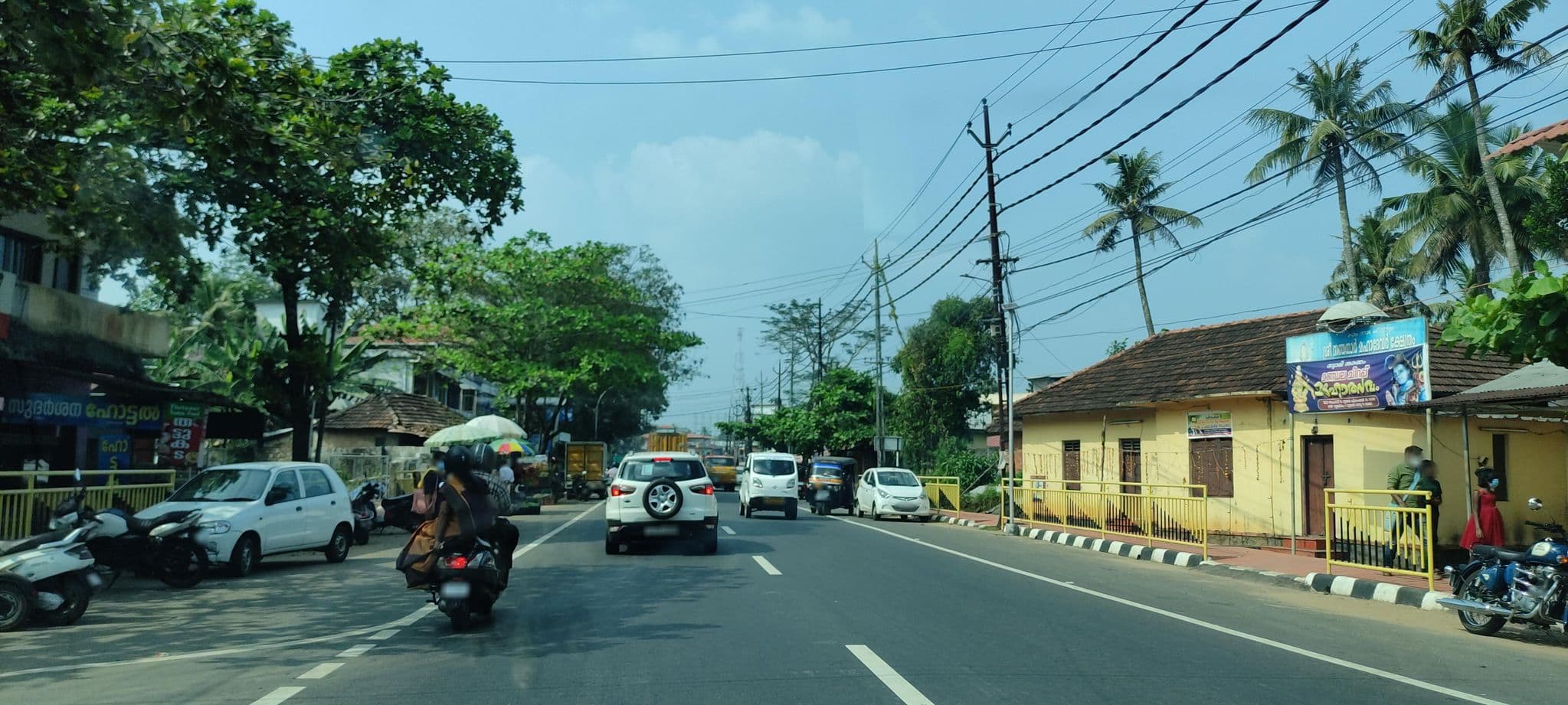 Street view near Sudarshana Hotel, Adūr — © V15 (CC BY-SA · Mapillary)