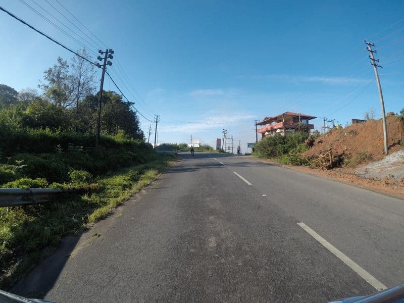Street view near Hotel Coorge Palace Inn, Madikeri — © deepak_bicycle (CC BY-SA · Mapillary)