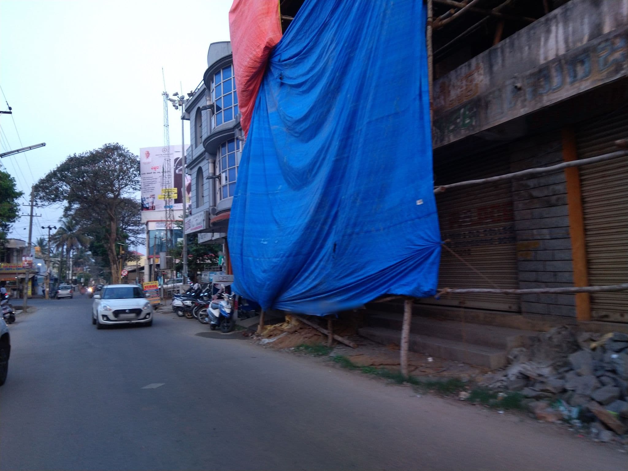 Street view near Koushika Sankethi Boys Hostel, Hassan — © chethan (CC BY-SA · Mapillary)