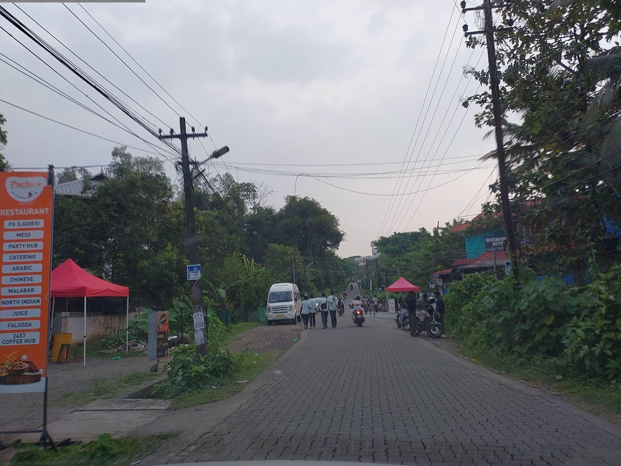 Street view near Usmans Store and Hostel, Kalamassery — © V15 (CC BY-SA · Mapillary)