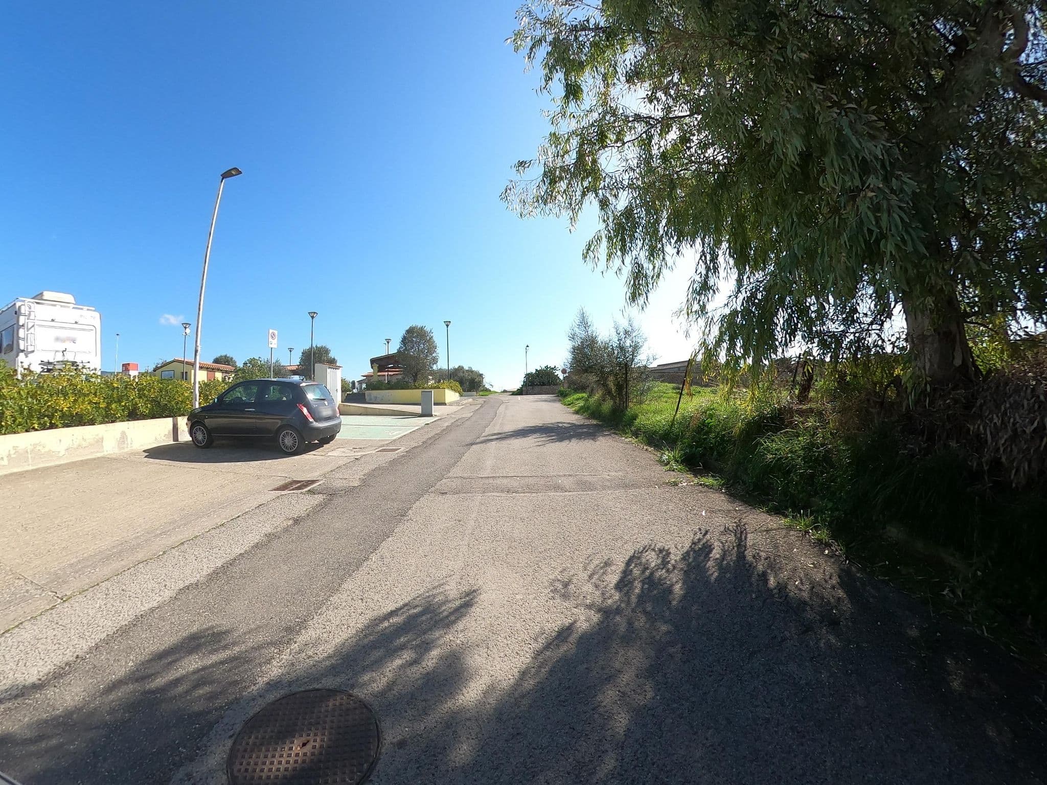 Street view near Area sosta camper Baradili, Tuili — © joostjakob (CC BY-SA · Mapillary)