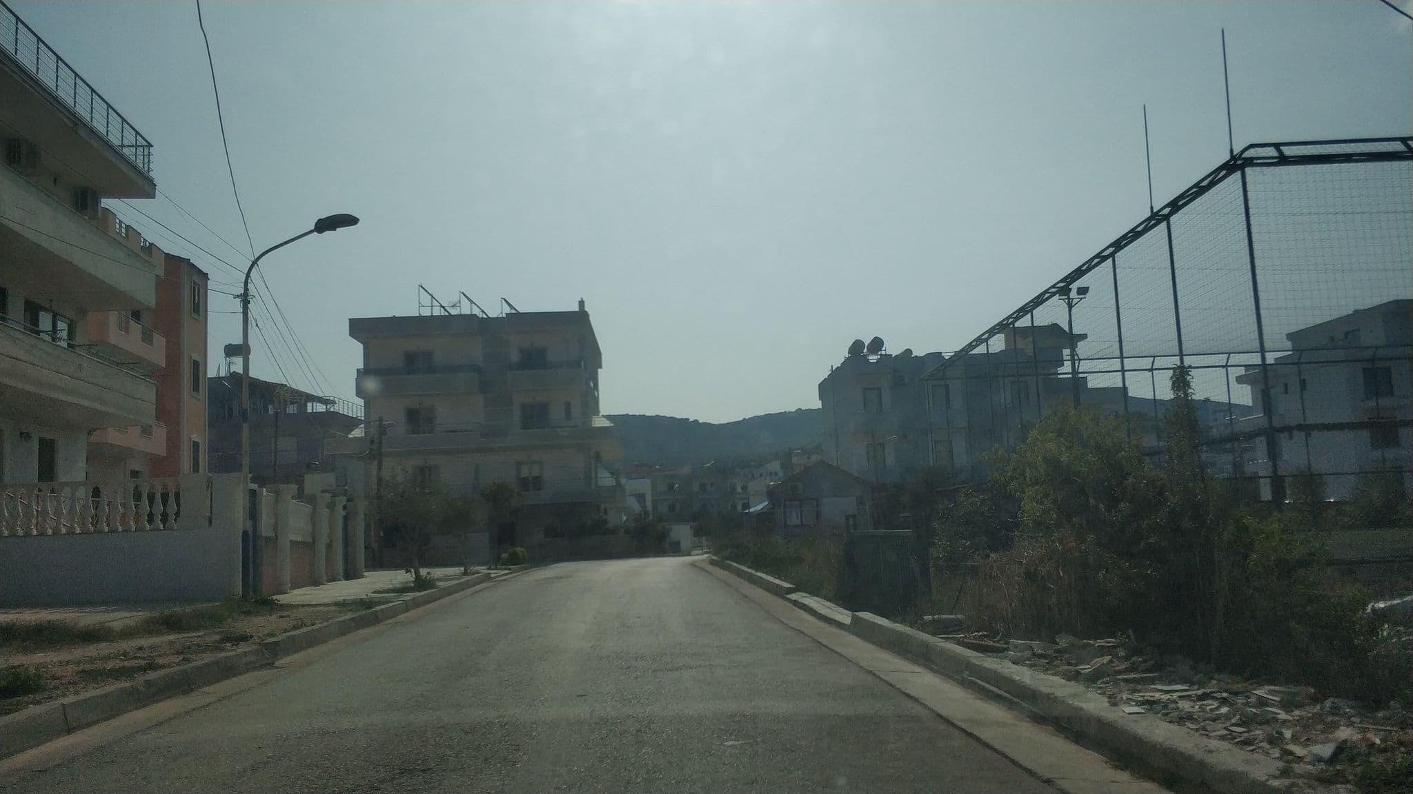 Street view near Vila Cerca de Mar, Ksamil — © freddouhelk (CC BY-SA · Mapillary)