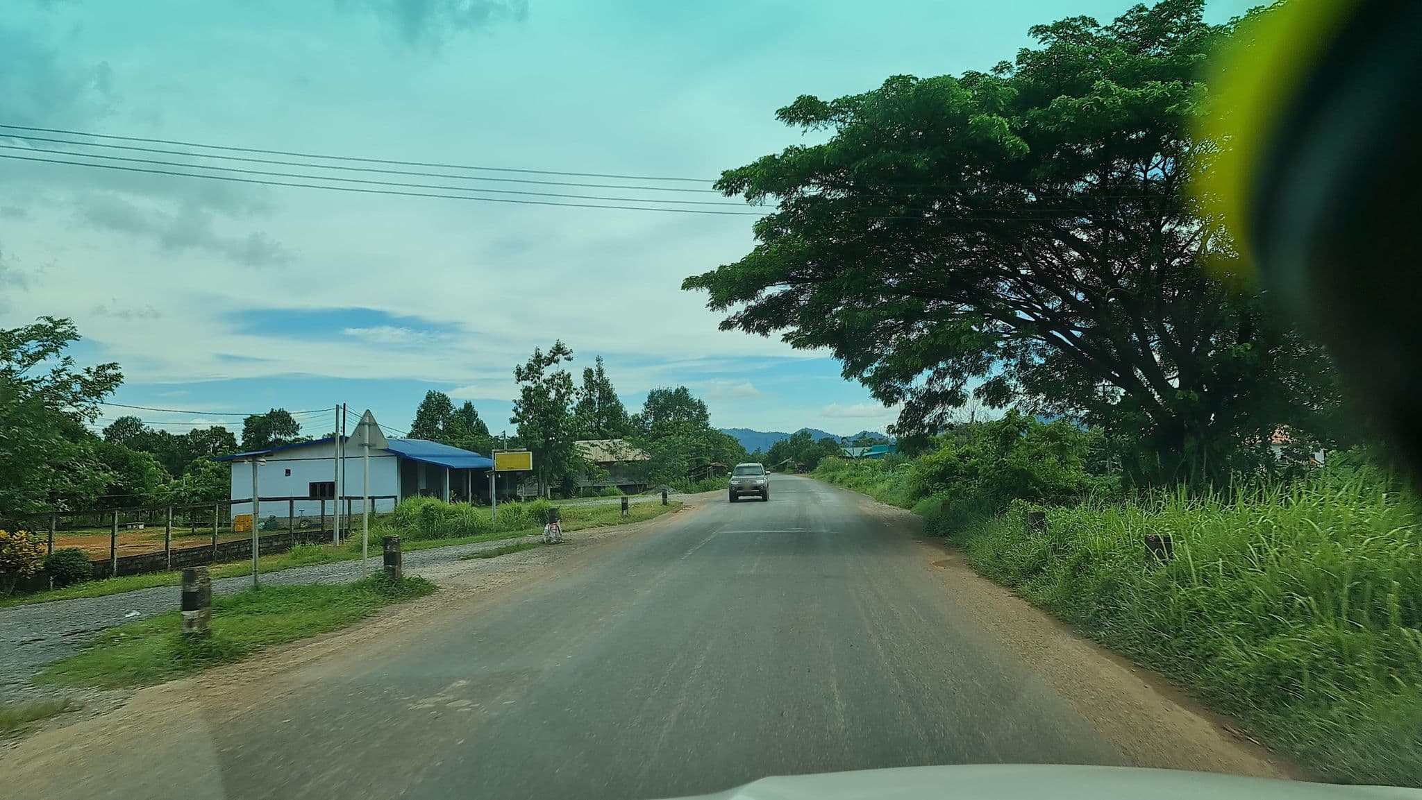 Street view near Santisuk Guest House, Ban Nahin — © thongdom (CC BY-SA · Mapillary)