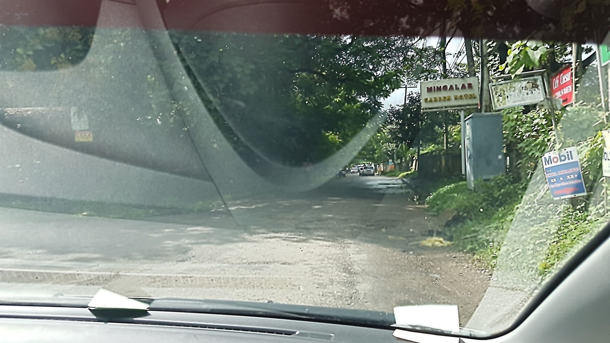 Street view near Mingalar Garden Hotel, Yangon — © aungphone (CC BY-SA · Mapillary)