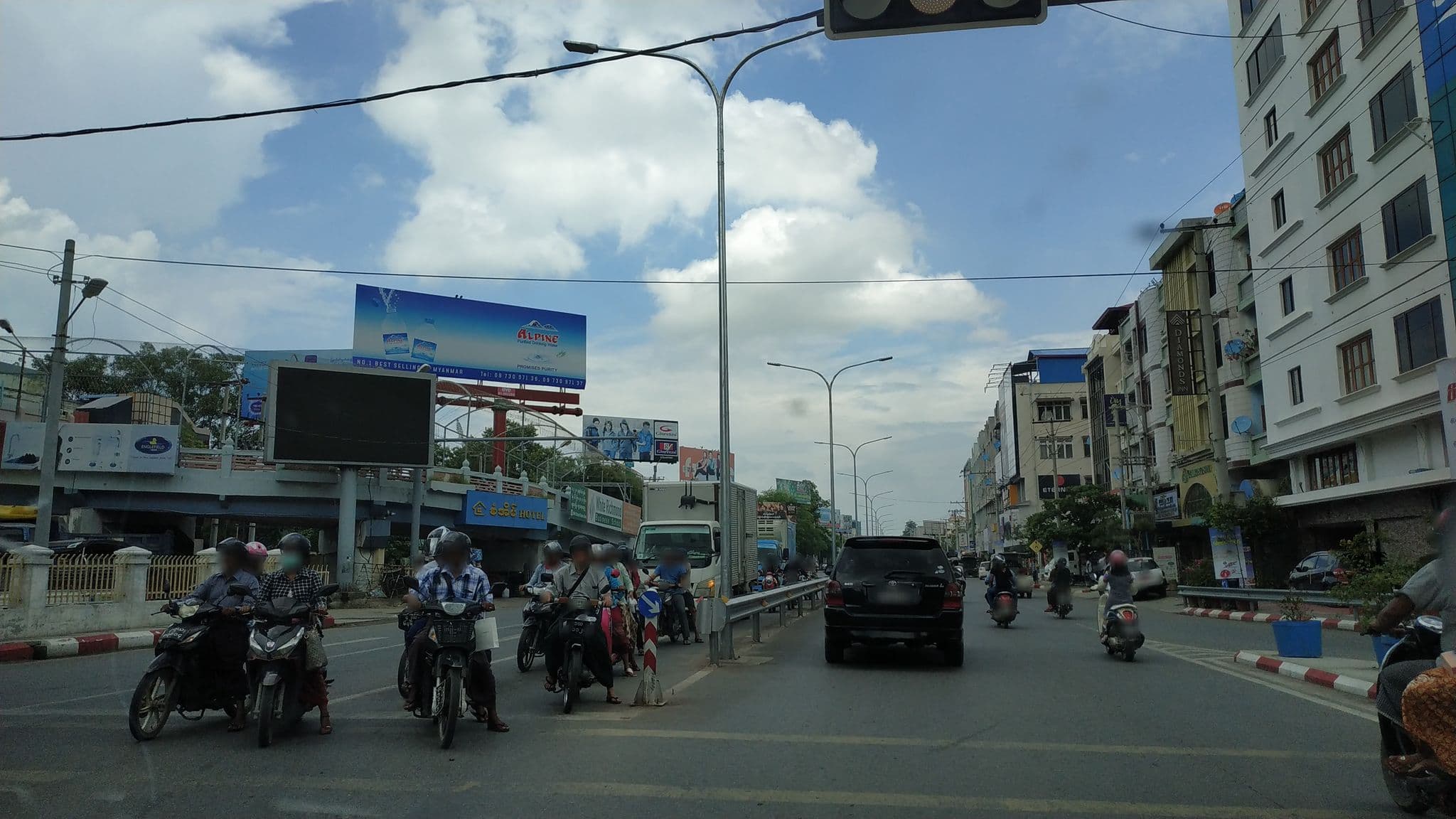 Street view near Shwe Ingyinn Hotel, Mandalay