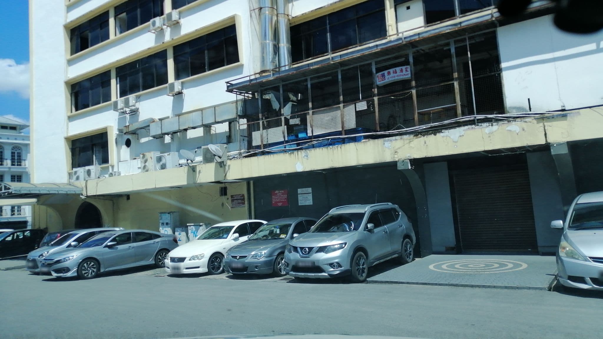 Street view near Theatre Hotel, Kuching — © addx (CC BY-SA · Mapillary)
