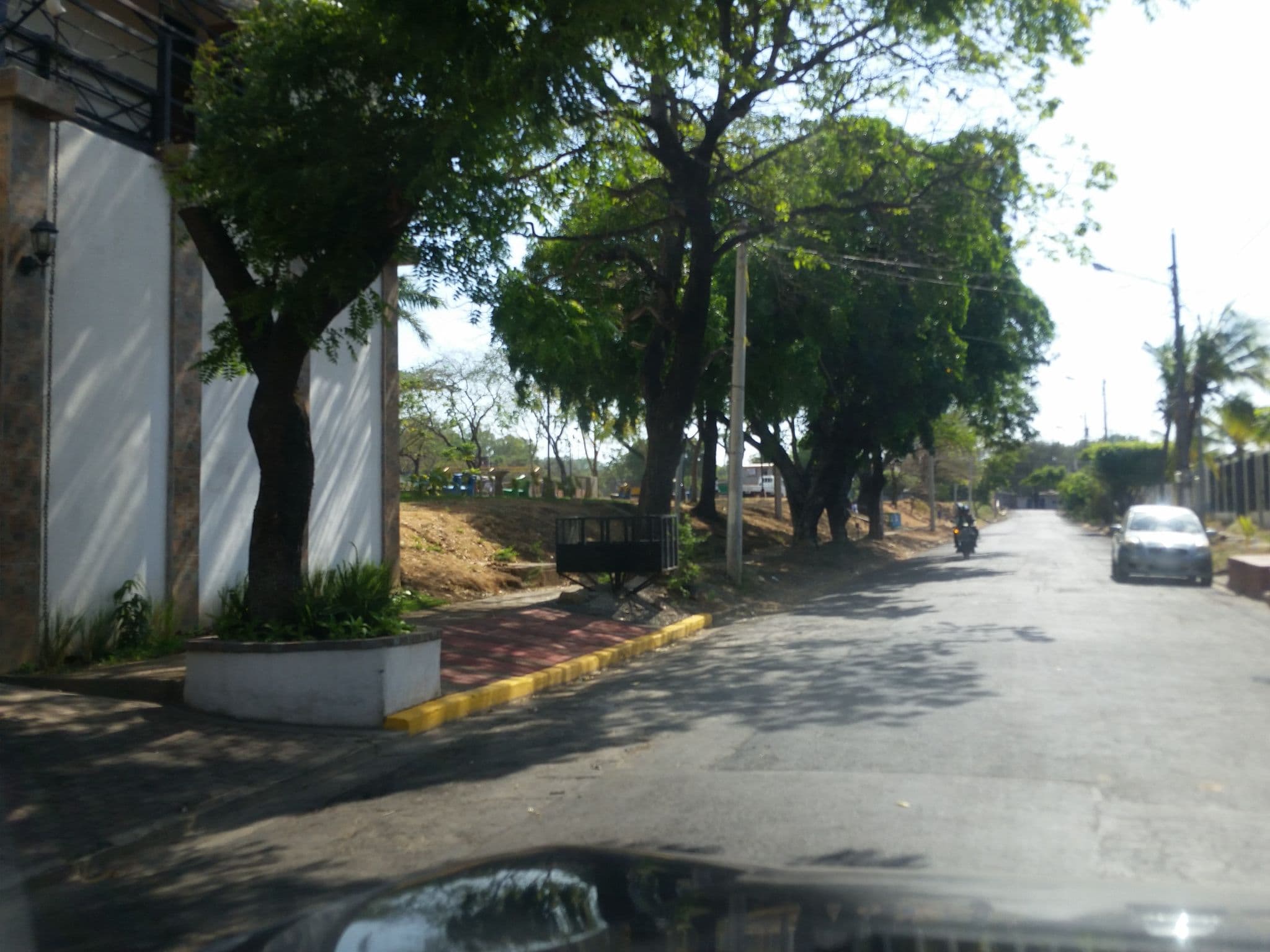 Street view near Aparthotel Villas de San Juan, Managua — © jaakkoh (CC BY-SA · Mapillary)