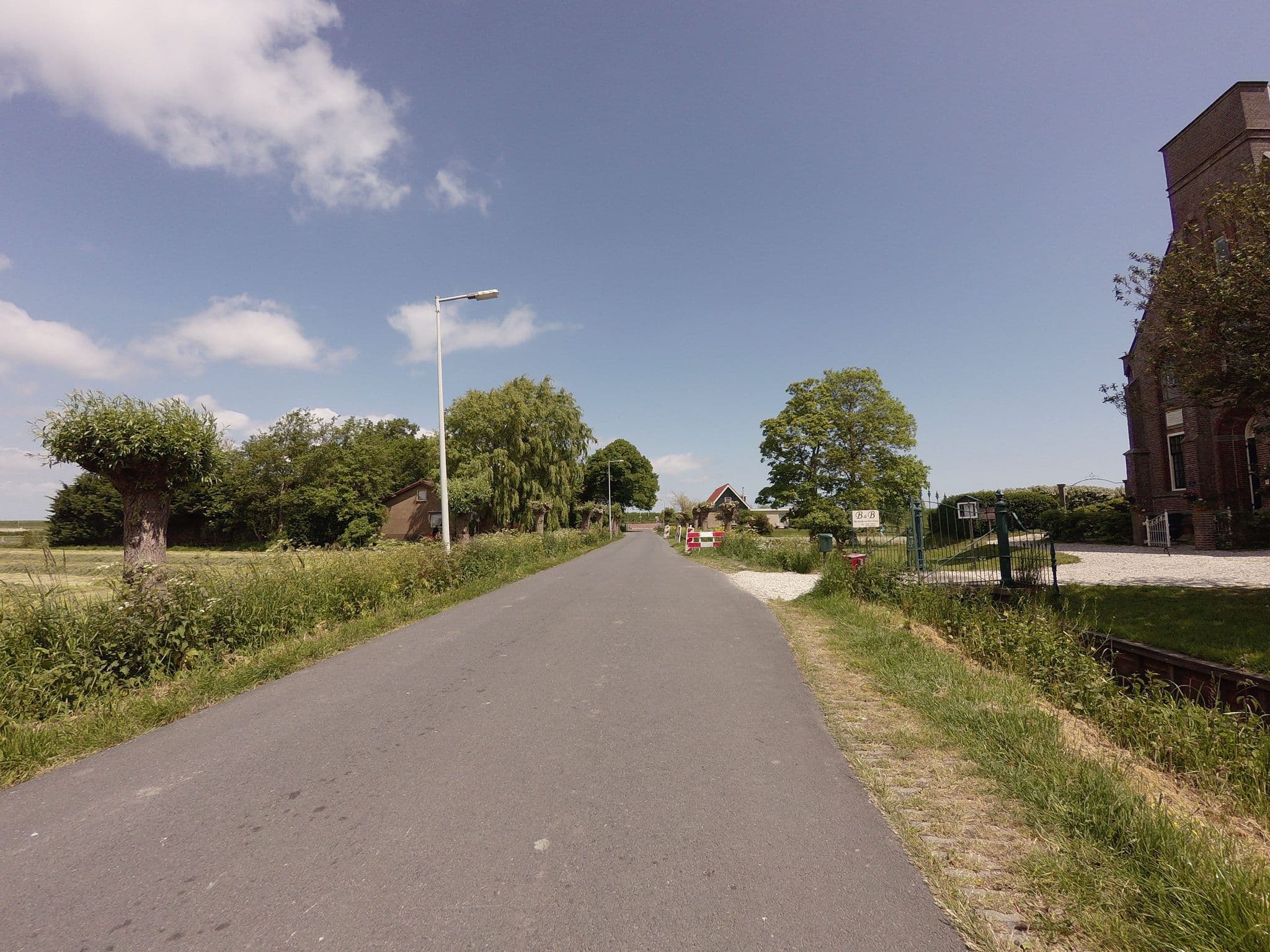 Street view near B&B Het Kerkje van Etersheim, Oosthuizen — © ankeric (CC BY-SA · Mapillary)