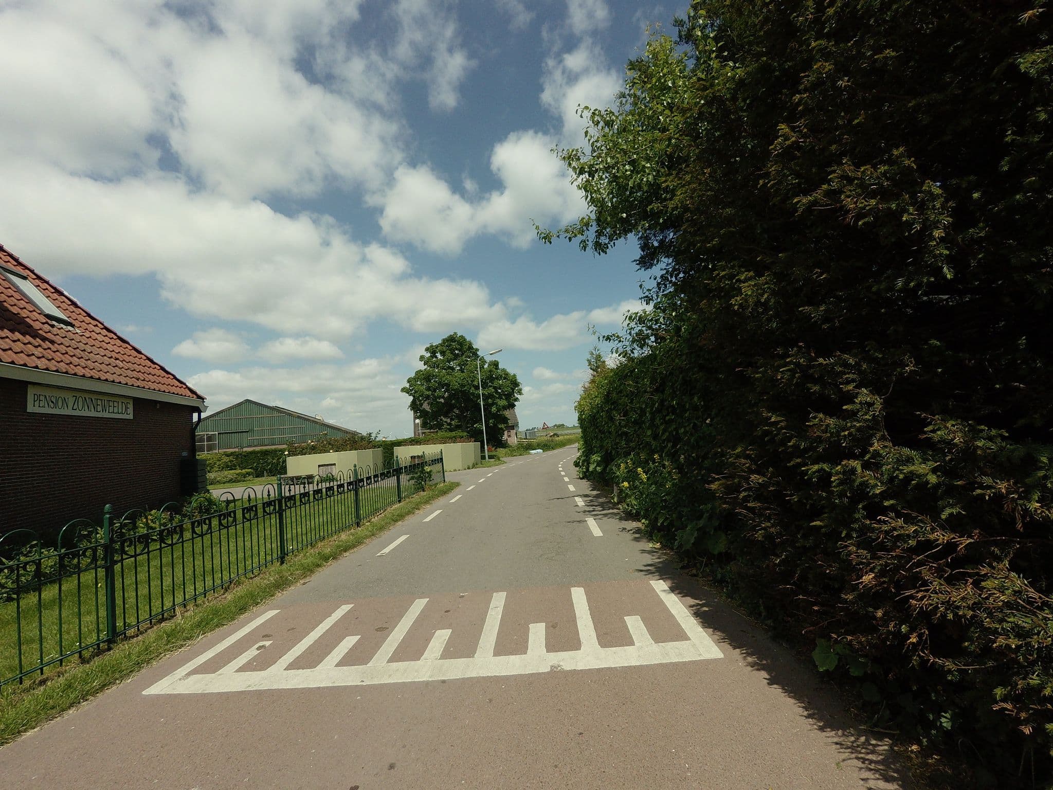 Street view near Pension Zonneweelde, Oosthuizen — © ankeric (CC BY-SA · Mapillary)