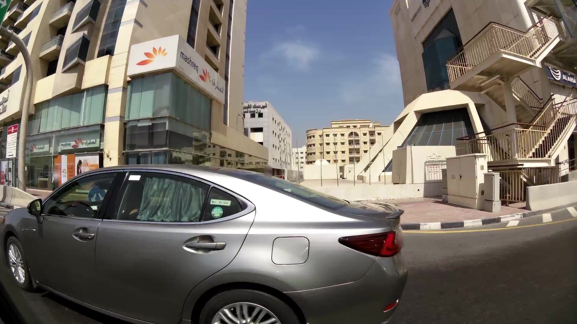 Street view near Najoum Hotel Apartments, Al Khabaisi — © kaartcam (CC BY-SA · Mapillary)