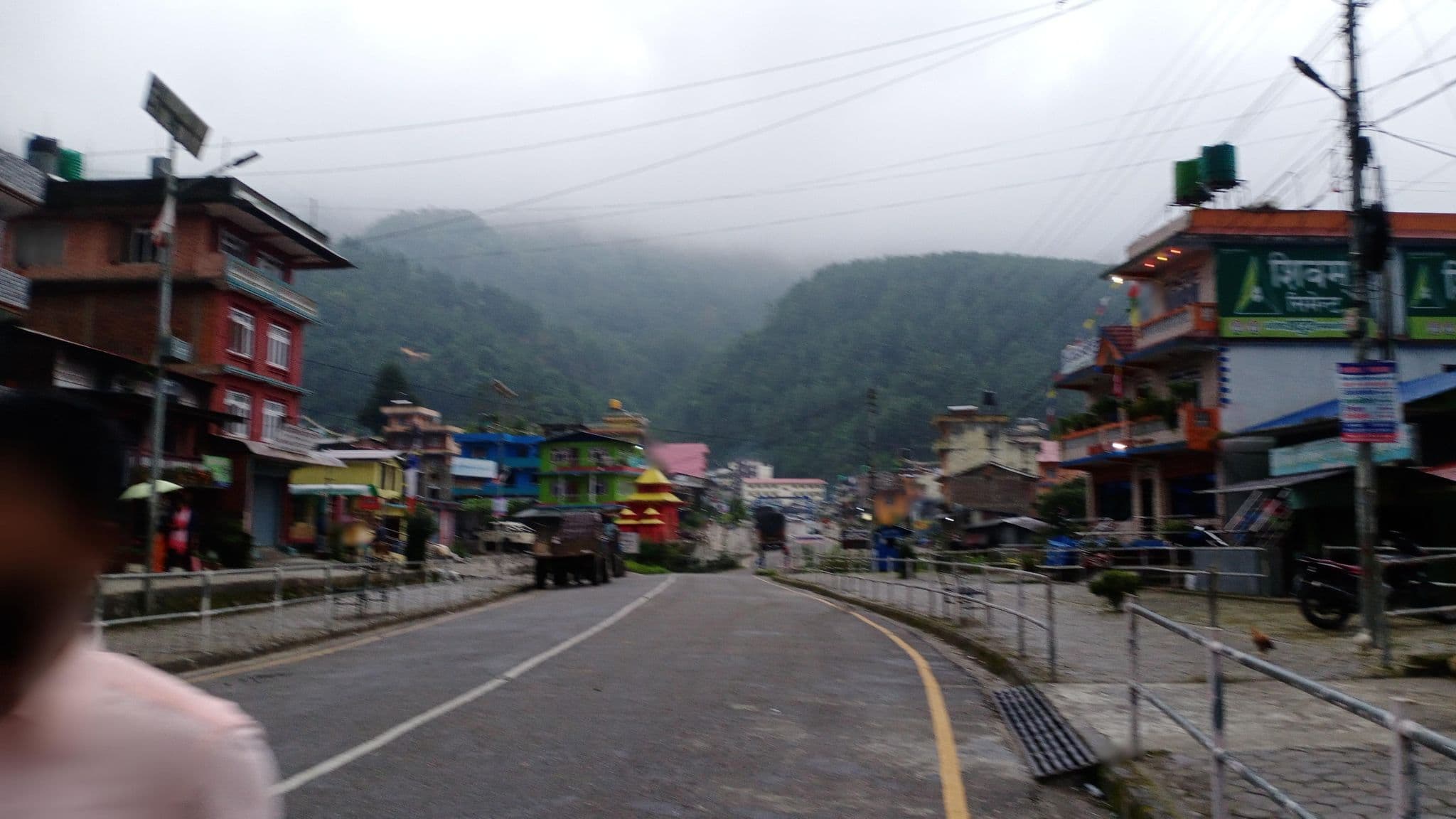 Street view near Abira Riverside Hotel and Resort Pvt. Ltd., Chari̇̄koṭ — © Rebmad7 (CC BY-SA · Mapillary)