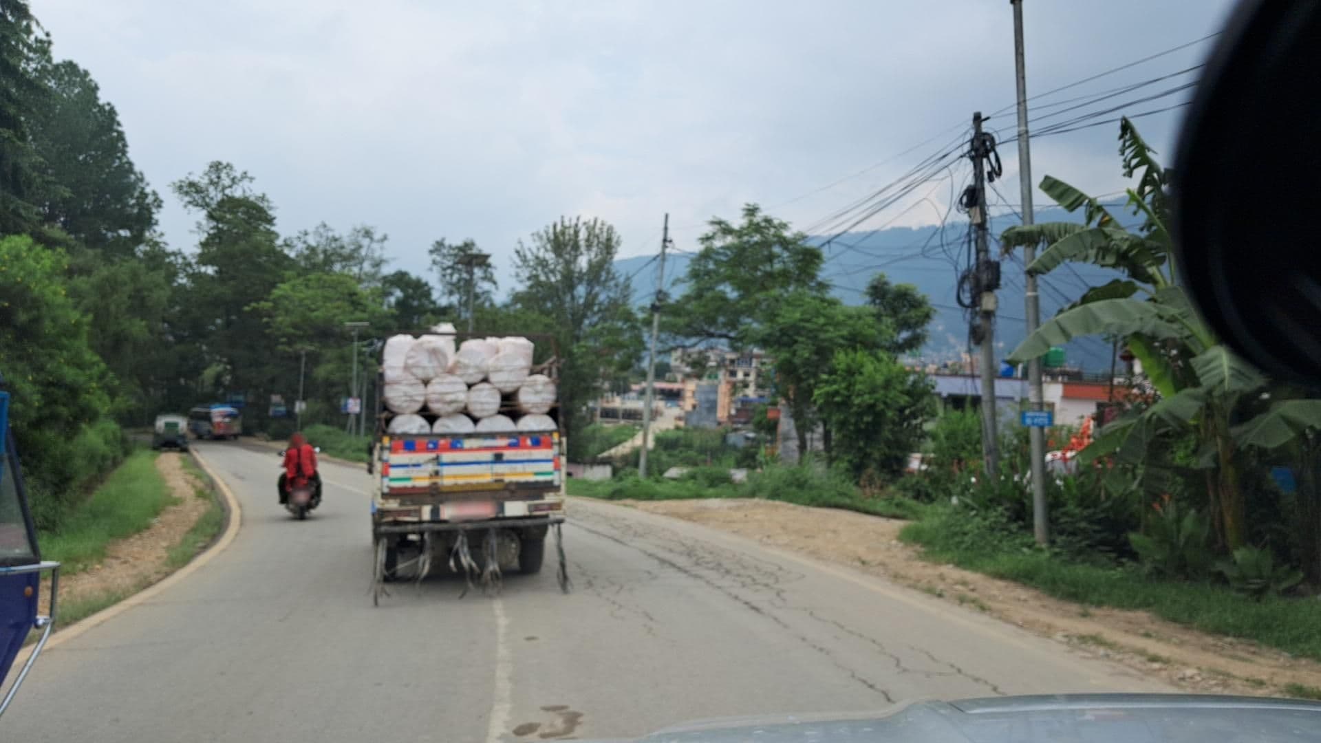 Street view near Jalbinayak Guest House And Resort, Ki̇̄rtipur — © roadroid (CC BY-SA · Mapillary)