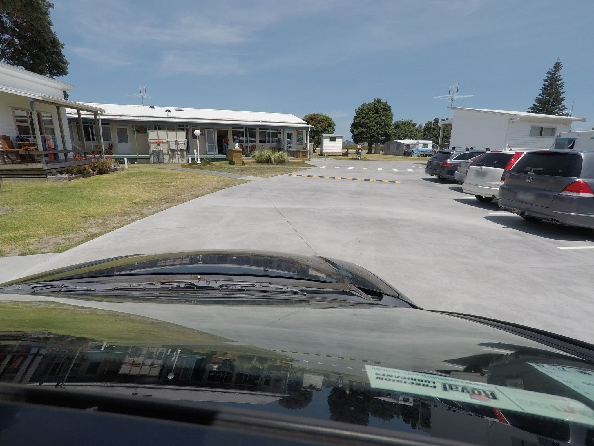 Street view near Whangateau Holiday Park, Leigh — © ralley (CC BY-SA · Mapillary)