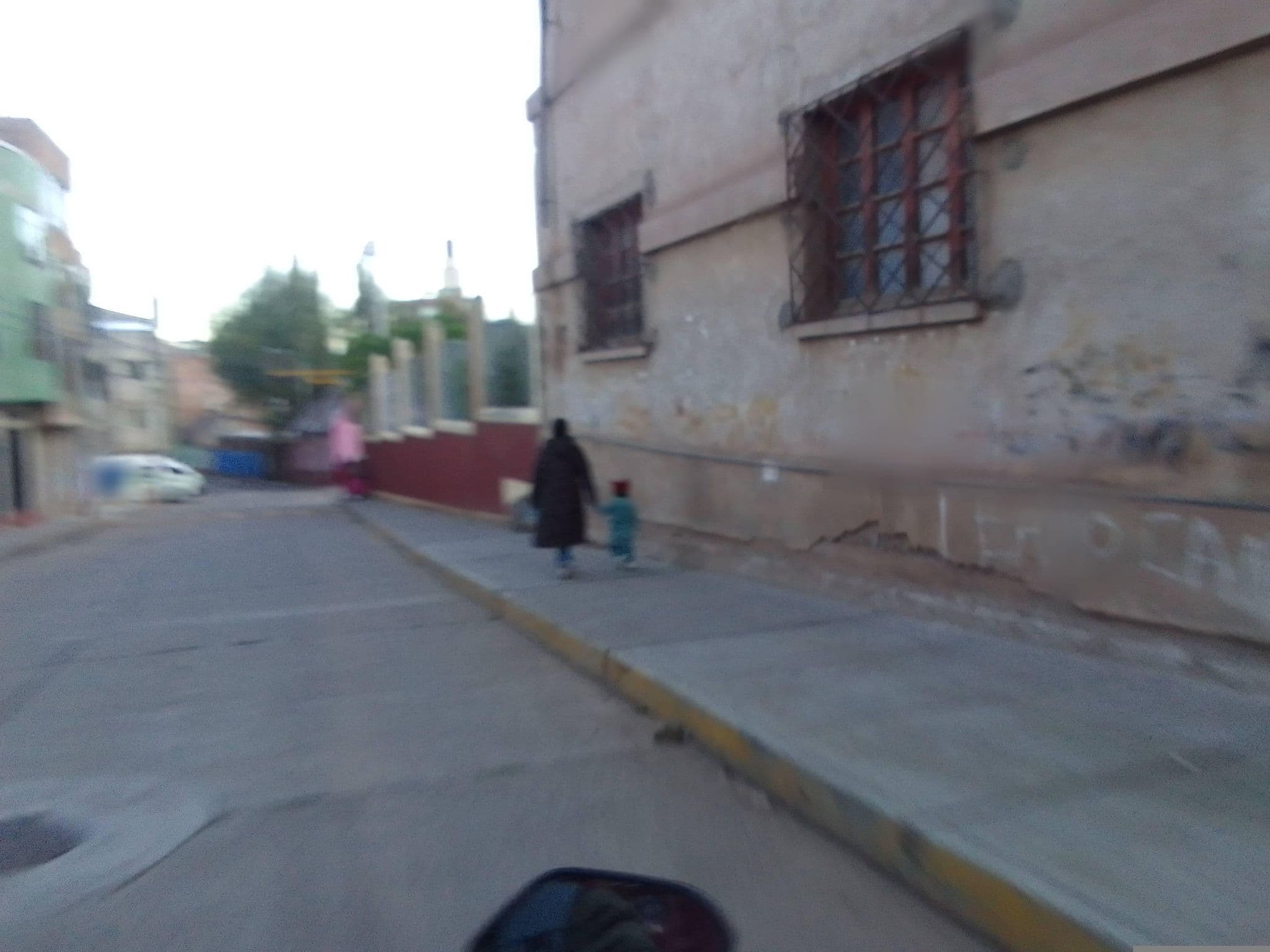 Street view near Lake Hostal, Puno — © quismani (CC BY-SA · Mapillary)