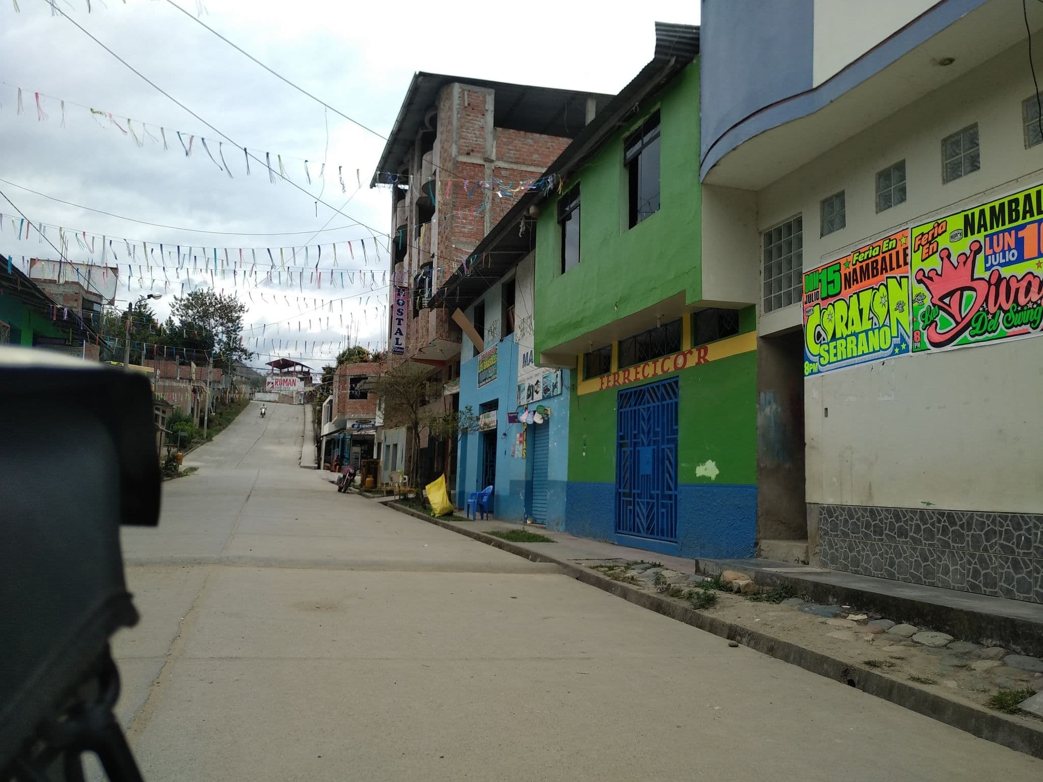 Street view near Hostal Flores, San Ignacio — © nomadmapper (CC BY-SA · Mapillary)