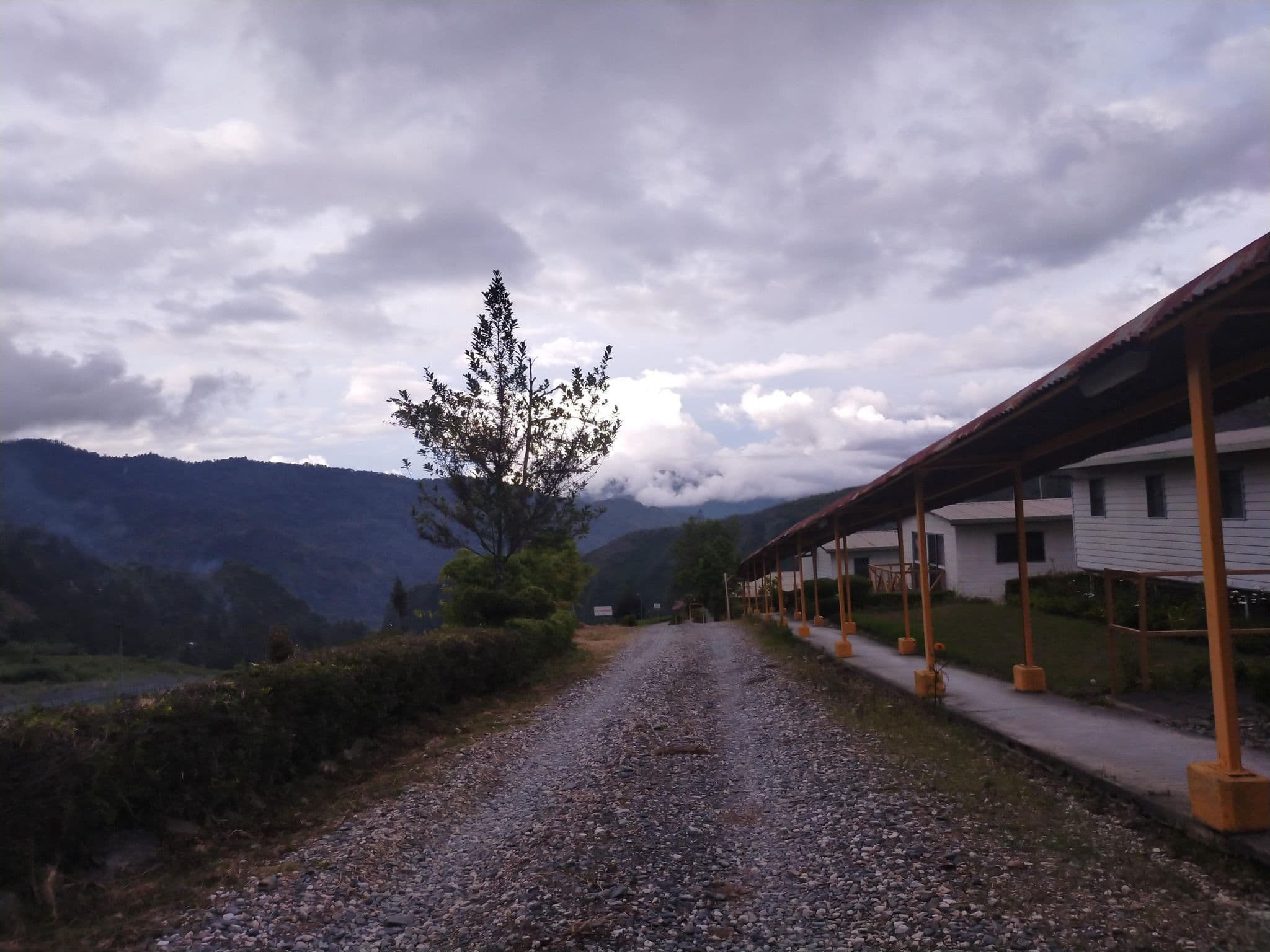 Street view near F-Block(13-24), Porgera — © nicxonpiaso (CC BY-SA · Mapillary)