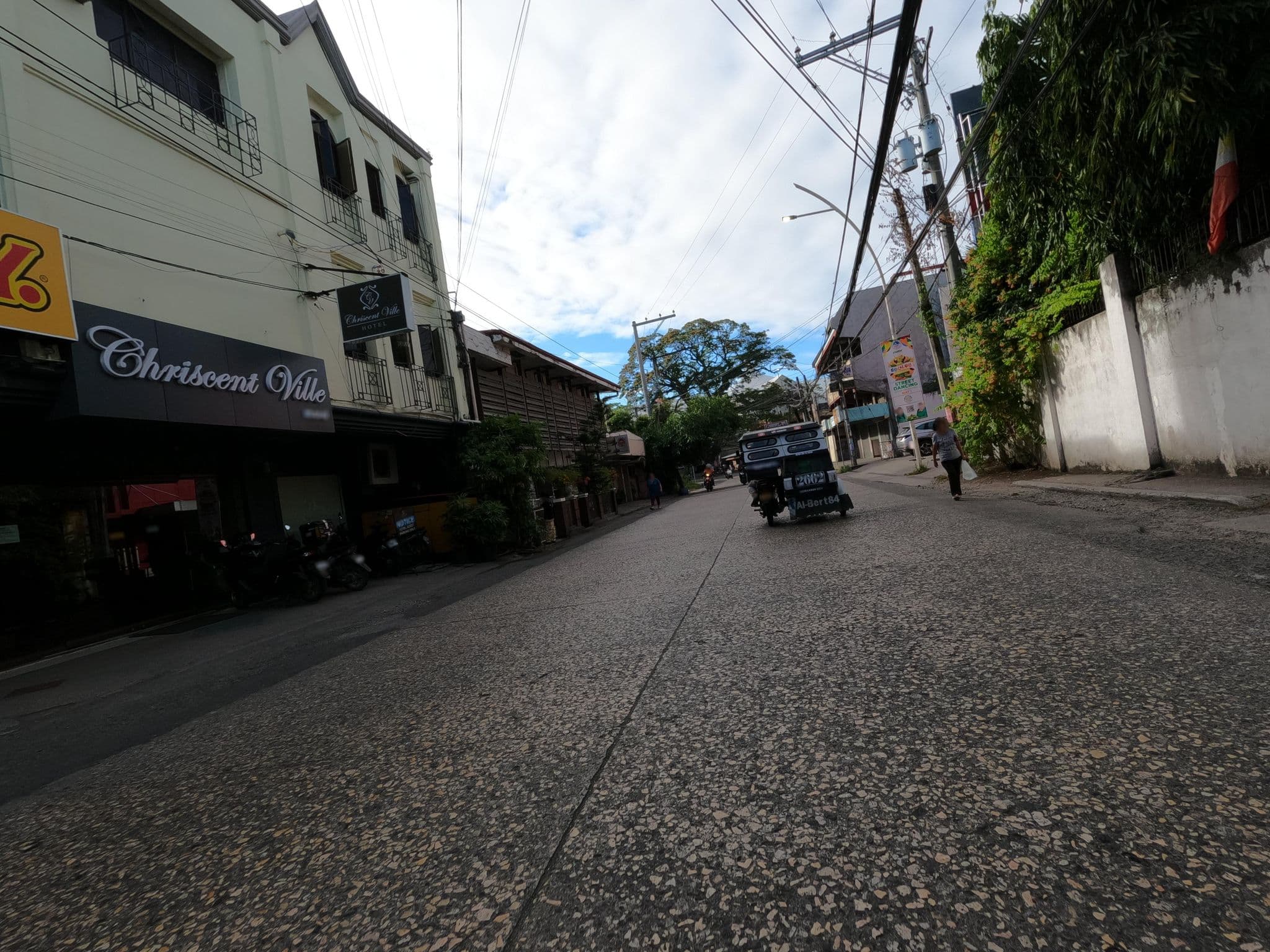 Street view near Chriscentville Hotel, Totolan — © GOwin (CC BY-SA · Mapillary)