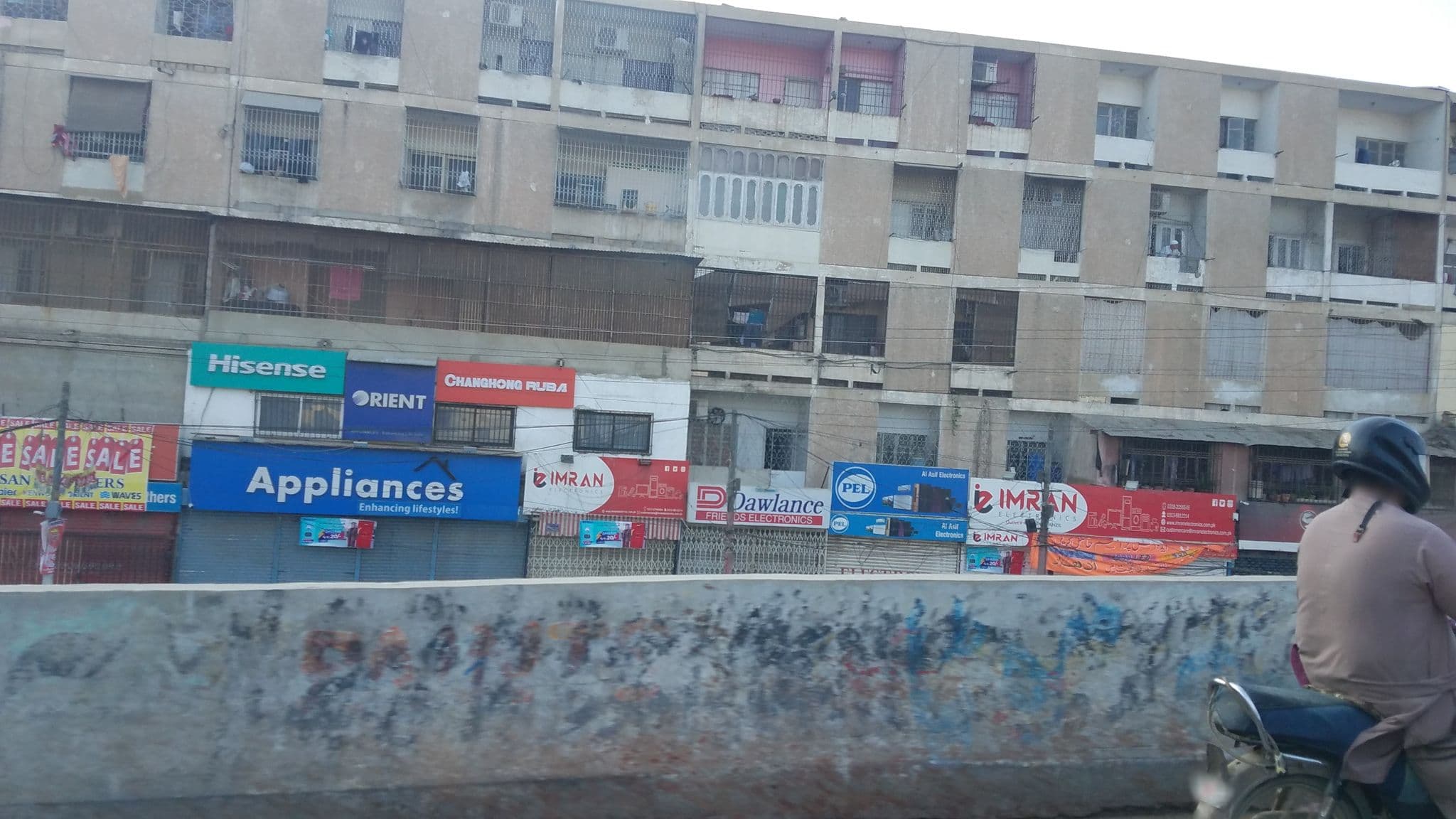 Street view near UK Plaza, Pakistan Employees Cooperative Housing Society — © nabamb (CC BY-SA · Mapillary)