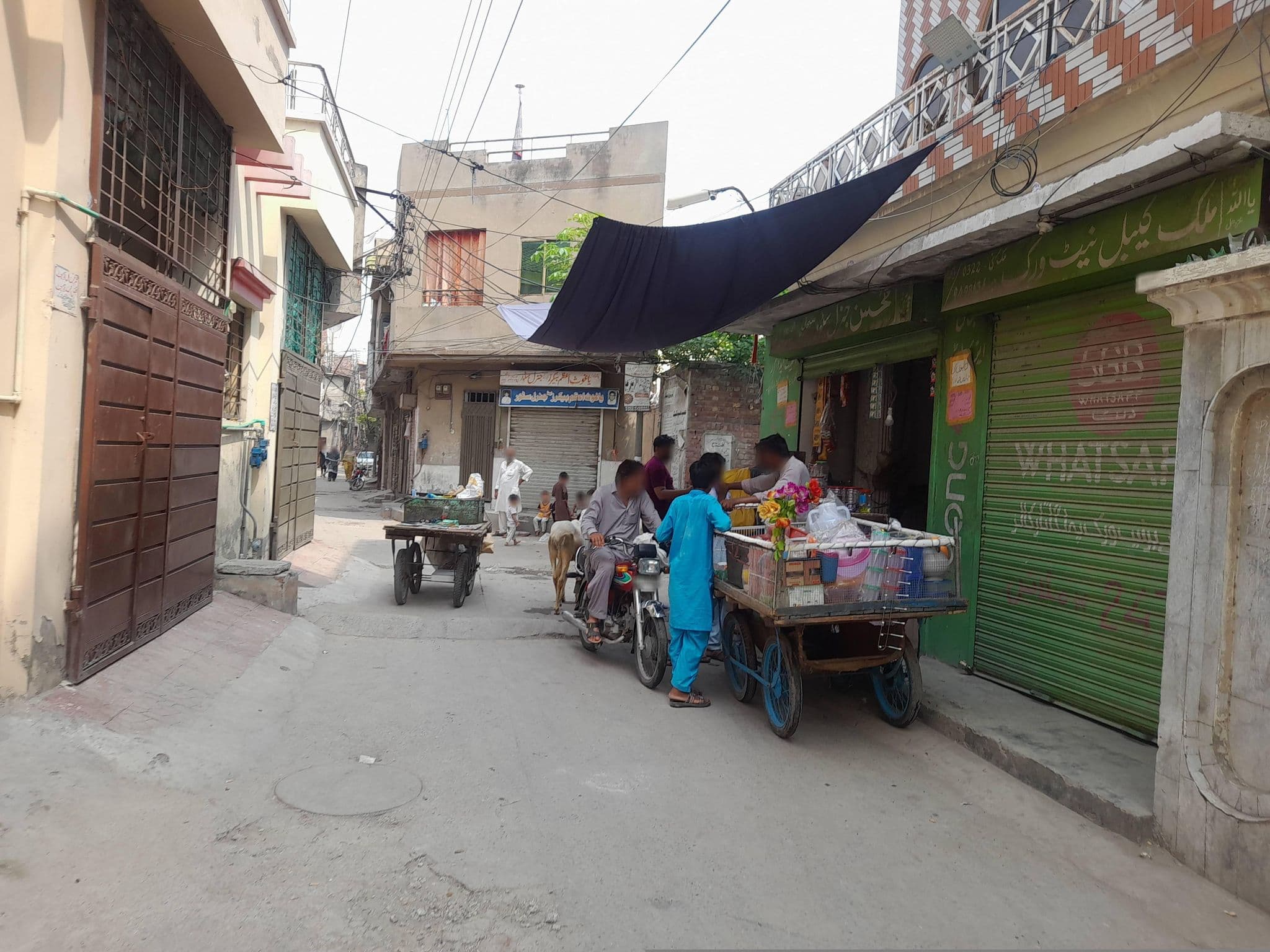 Street view near Masood Ul Hassan Siddique, Model Town — © Zain_Ali (CC BY-SA · Mapillary)