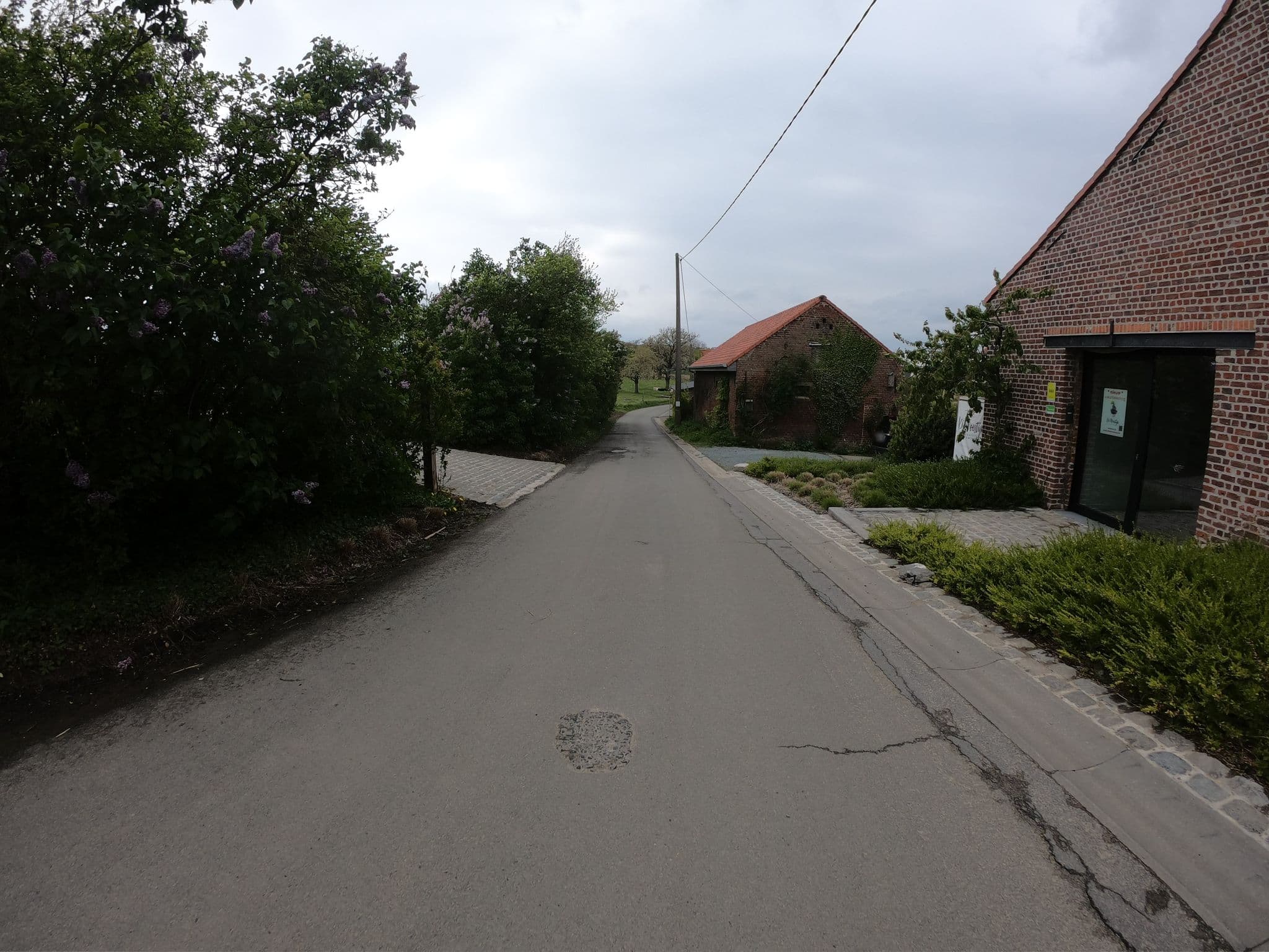 Street view near De Woestijn, Meerbeke — © joostjakob (CC BY-SA · Mapillary)