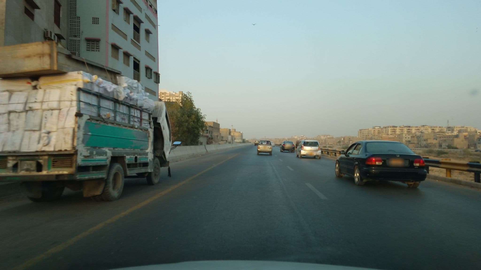 Street view near Abbas Hotel, Pakistan Employees Cooperative Housing Society