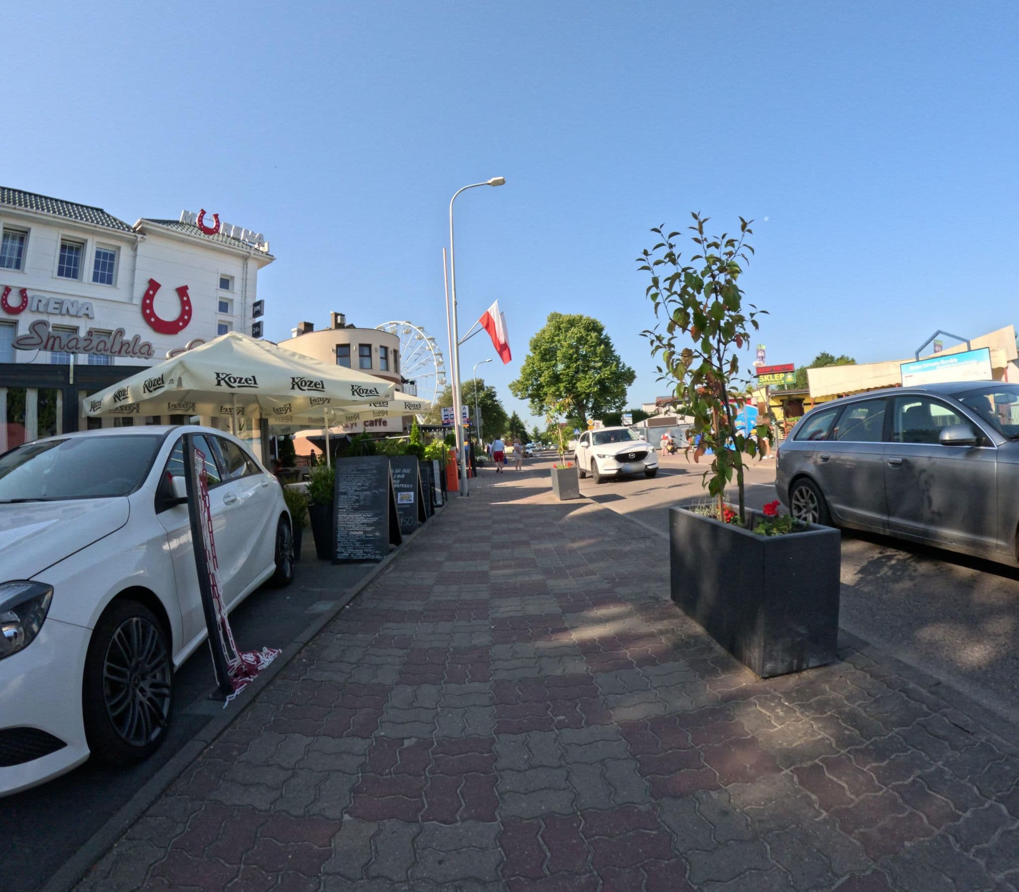 Street view near Surga Apartament, Ustronie Morskie — © krzyk (CC BY-SA · Mapillary)